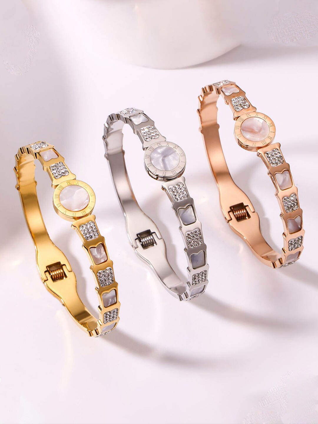 Jewels Galaxy Set Of 3 American Diamond Studded Bangle-Style Bracelet, Rose gold
Jewels Galaxy Set Of 3 American Diamond Studded Bangle-Style Bracelet, Rose gold