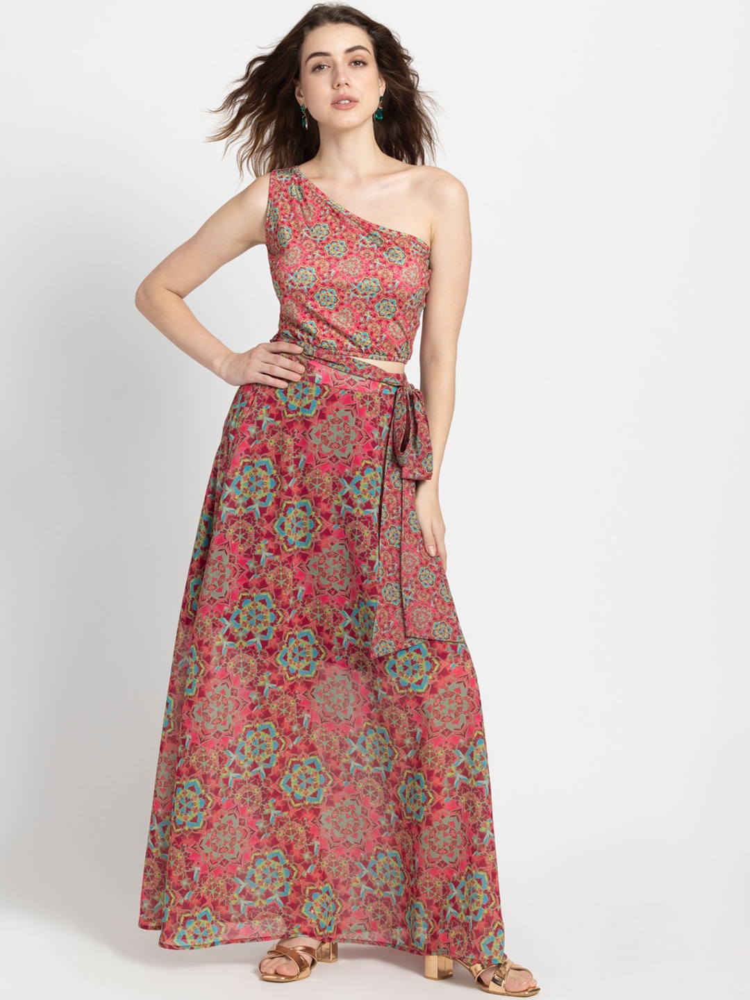 SHAYE Ethnic Motifs Printed One Shoulder Sleeveless Crop Top With A-line Long Skirt, Pink
SHAYE Ethnic Motifs Printed One Shoulder Sleeveless Crop Top With A-line Long Skirt, Pink