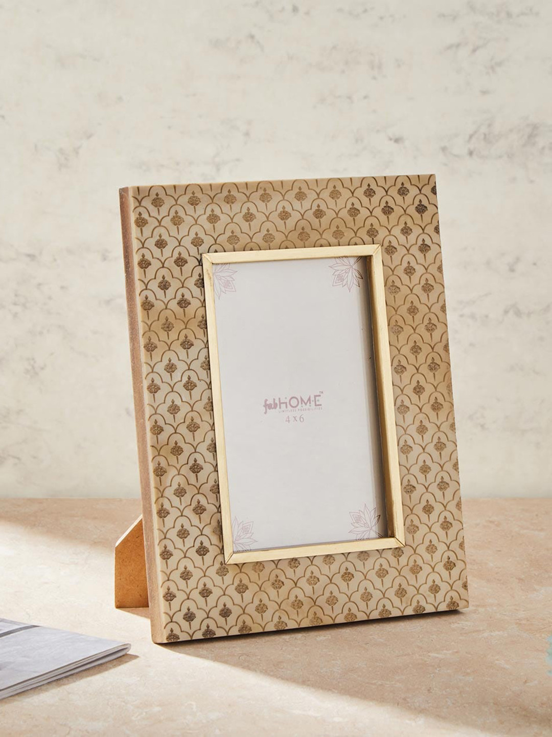 Fabindia White & Beige Shalimaar Resin Cutwork Photo frame 
Fabindia White & Beige Shalimaar Resin Cutwork Photo frame