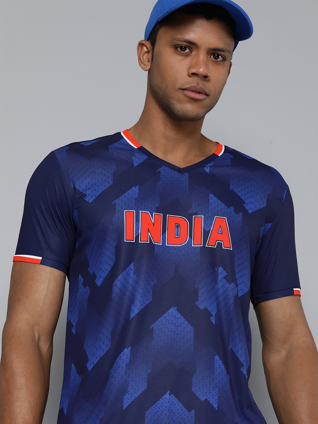 HRX by Hrithik Roshan Men World Cup Series Typography Printed V-Neck T-shirt, Navy blue
HRX by Hrithik Roshan Men World Cup Series Typography Printed V-Neck T-shirt, Navy blue