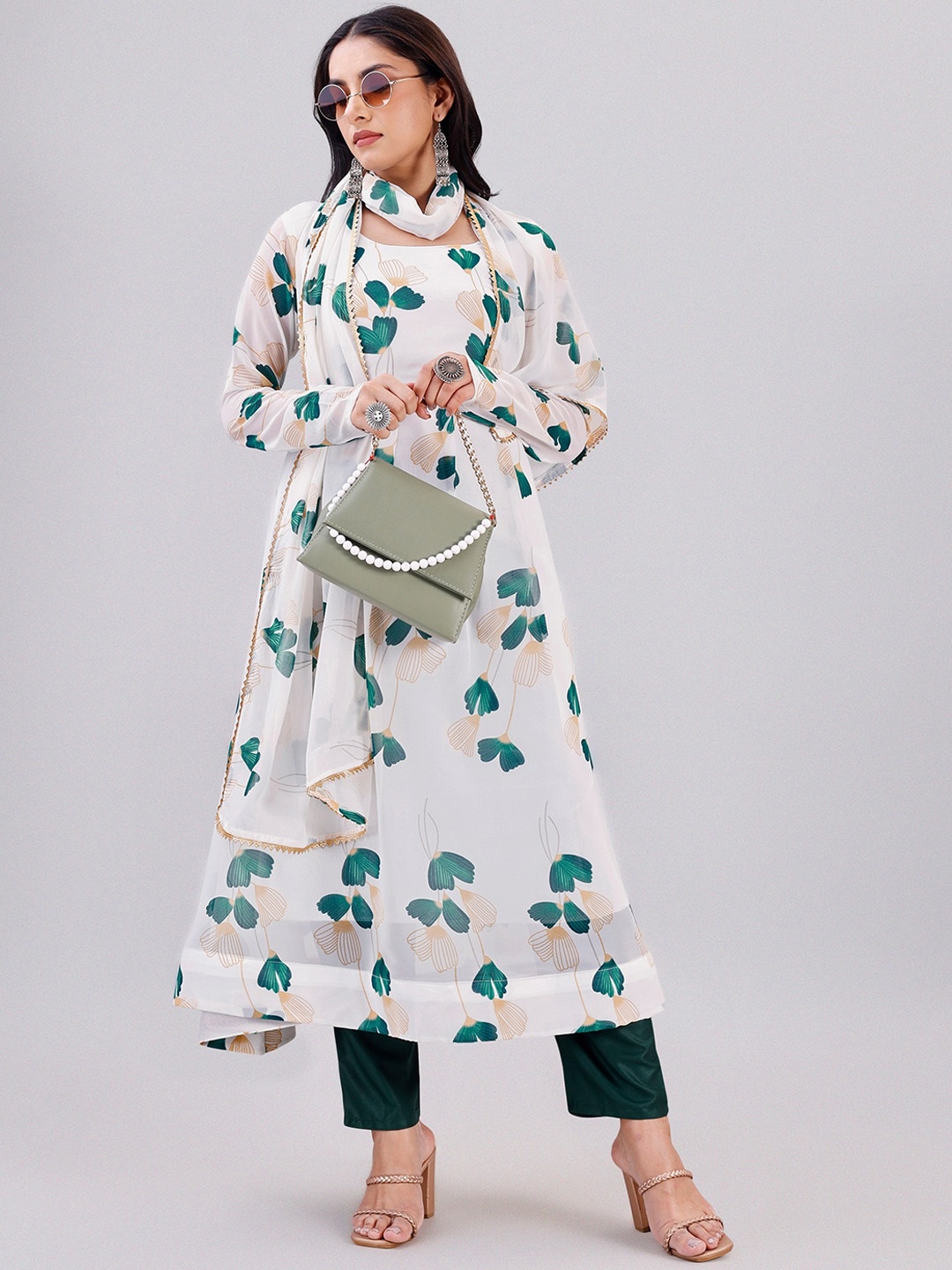 ASPORA Floral Printed Regular Gotta Patti Anarkali Georgette Kurta with Trousers & Dupatta, White
ASPORA Floral Printed Regular Gotta Patti Anarkali Georgette Kurta with Trousers & Dupatta, White