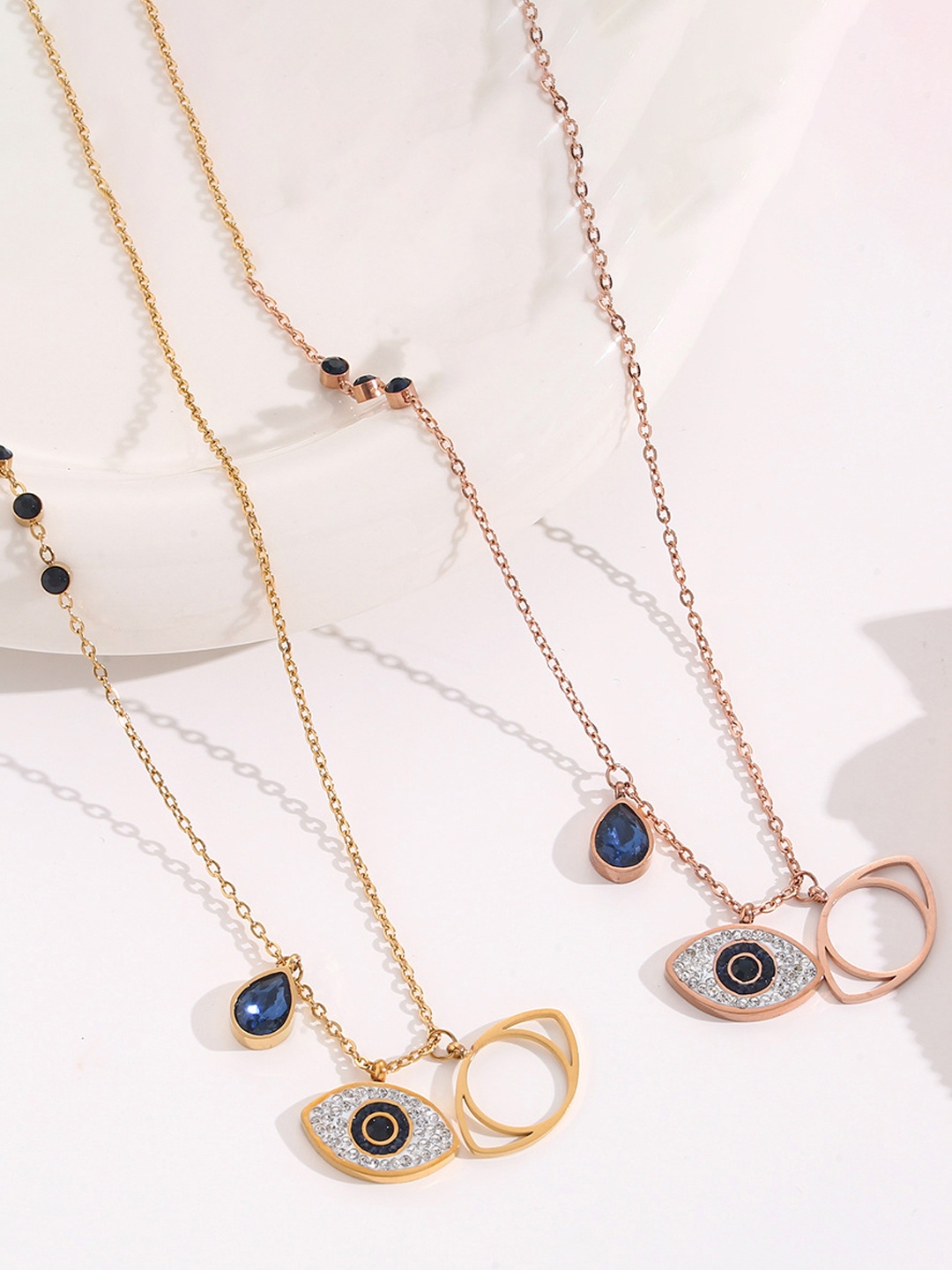 Jewels Galaxy Set Of 2 Gold-plated & Rose Gold-plated AD-studded Evil Eye Pendants & Chain
Jewels Galaxy Set Of 2 Gold-plated & Rose Gold-plated AD-studded Evil Eye Pendants & Chain