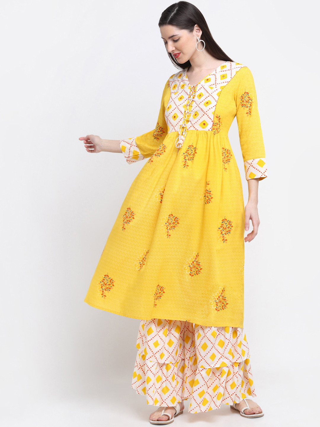 Assamica Ethnic Motifs Printed Anarkali Thread Work Yoke Design Kurta with Sharara, Yellow
Assamica Ethnic Motifs Printed Anarkali Thread Work Yoke Design Kurta with Sharara, Yellow