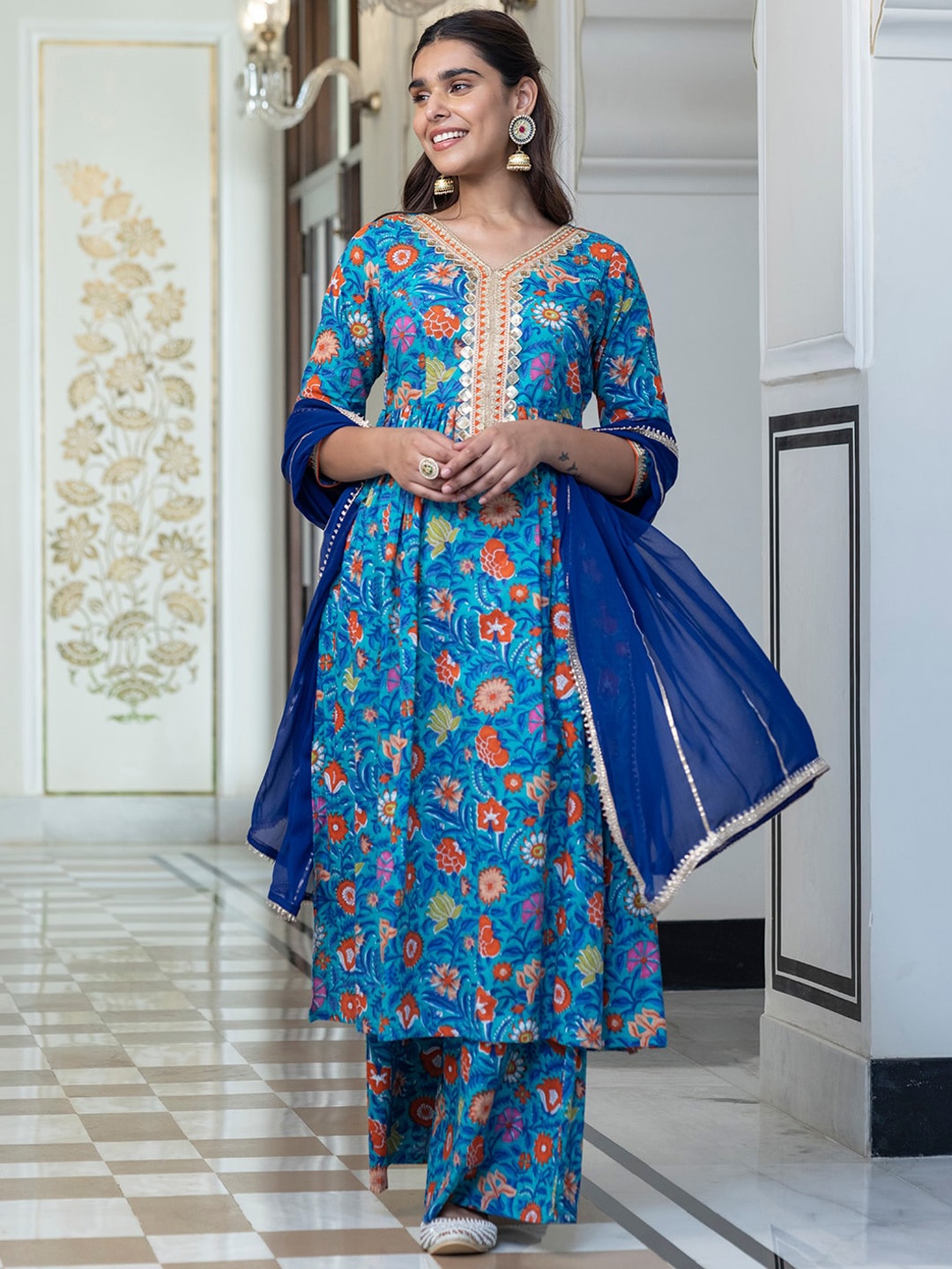 Janasya Women Blue Floral Printed Empire Gotta Patti Pure Cotton Kurta with Palazzos & With Dupatta
Janasya Women Blue Floral Printed Empire Gotta Patti Pure Cotton Kurta with Palazzos & With Dupatta
