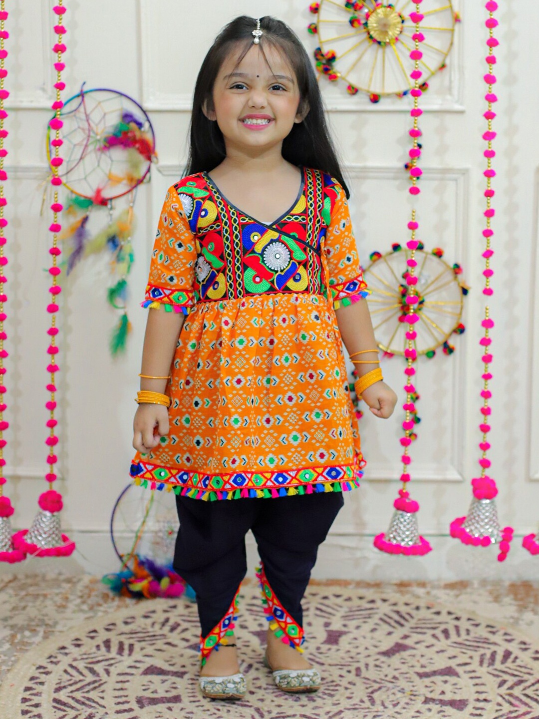 BownBee Girls Printed Thread Work Pure Cotton Angrakha A-line Kurta With Dhoti Pants, Yellow
BownBee Girls Printed Thread Work Pure Cotton Angrakha A-line Kurta With Dhoti Pants, Yellow