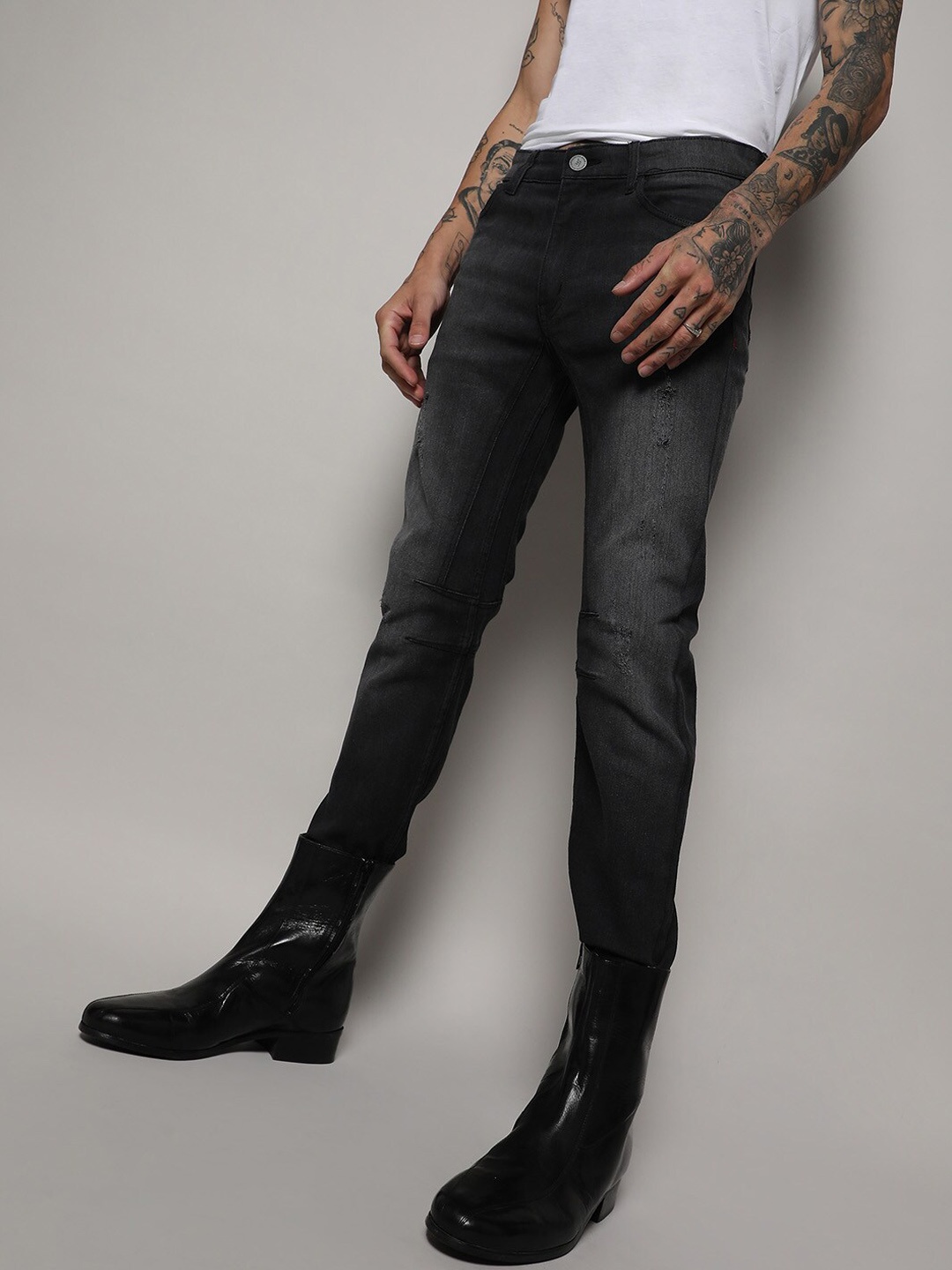Campus Sutra Men Black Smart Slim Fit Mildly Distressed Light Fade Stretchable Jeans
Campus Sutra Men Black Smart Slim Fit Mildly Distressed Light Fade Stretchable Jeans