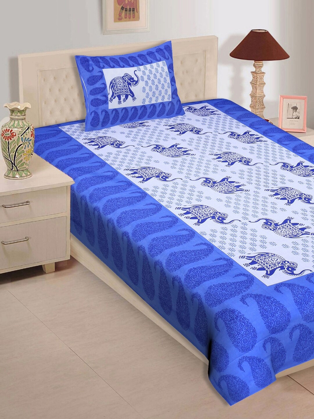 Rajasthanikart Blue & White Ethnic Motifs Cotton 120 TC Single Bedsheet & 1 Pillow Cover
Rajasthanikart Blue & White Ethnic Motifs Cotton 120 TC Single Bedsheet & 1 Pillow Cover