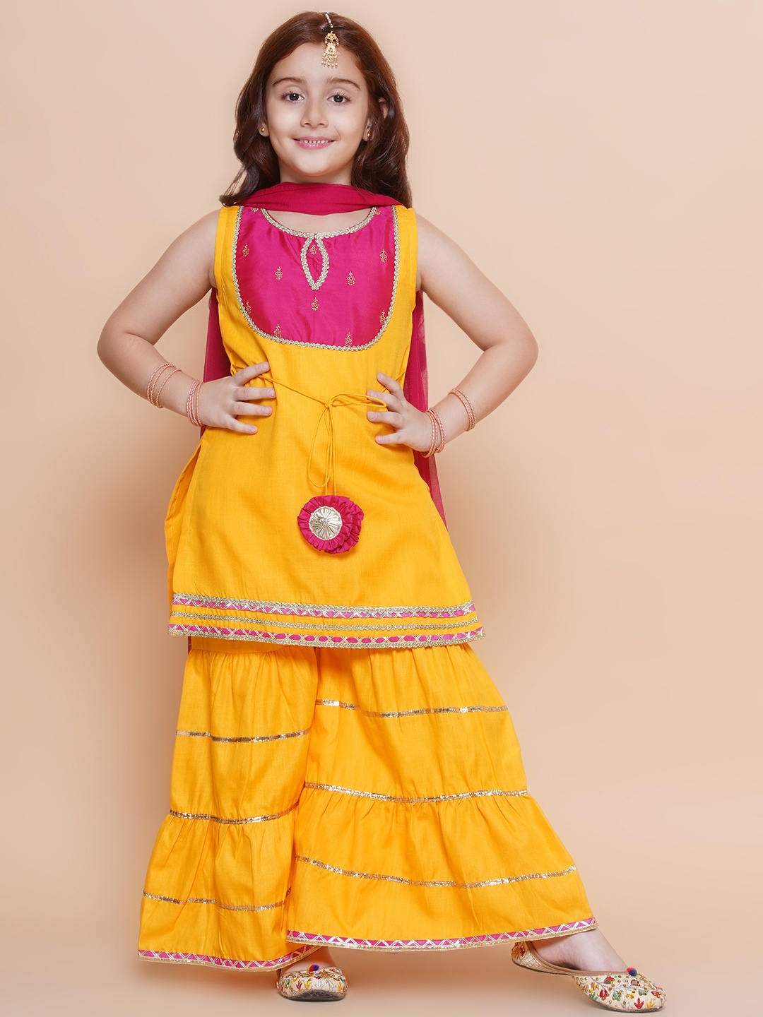 Bitiya by Bhama Girls Yoke Design Straight Kurta with Sharara & With Dupatta, Yellow
Bitiya by Bhama Girls Yoke Design Straight Kurta with Sharara & With Dupatta, Yellow