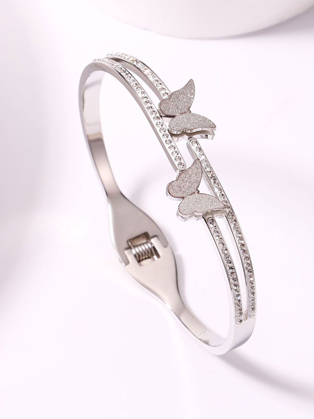 Jewels Galaxy Silver Plated Stainless Steel American Diamond Stone Studded Cuff Bracelet
Jewels Galaxy Silver Plated Stainless Steel American Diamond Stone Studded Cuff Bracelet