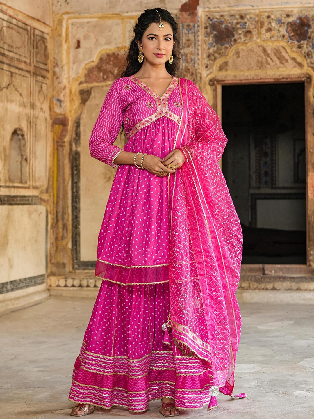 SCAKHI Bandhani Printed Empire Gotta Patti Chanderi Silk Kurti With Sharara & Dupatta, Pink
SCAKHI Bandhani Printed Empire Gotta Patti Chanderi Silk Kurti With Sharara & Dupatta, Pink