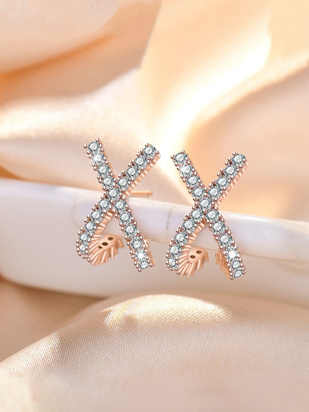 Jewels Galaxy Rose Gold Plated American Diamond Studded Cross Shape Korean Stud Earrings
Jewels Galaxy Rose Gold Plated American Diamond Studded Cross Shape Korean Stud Earrings