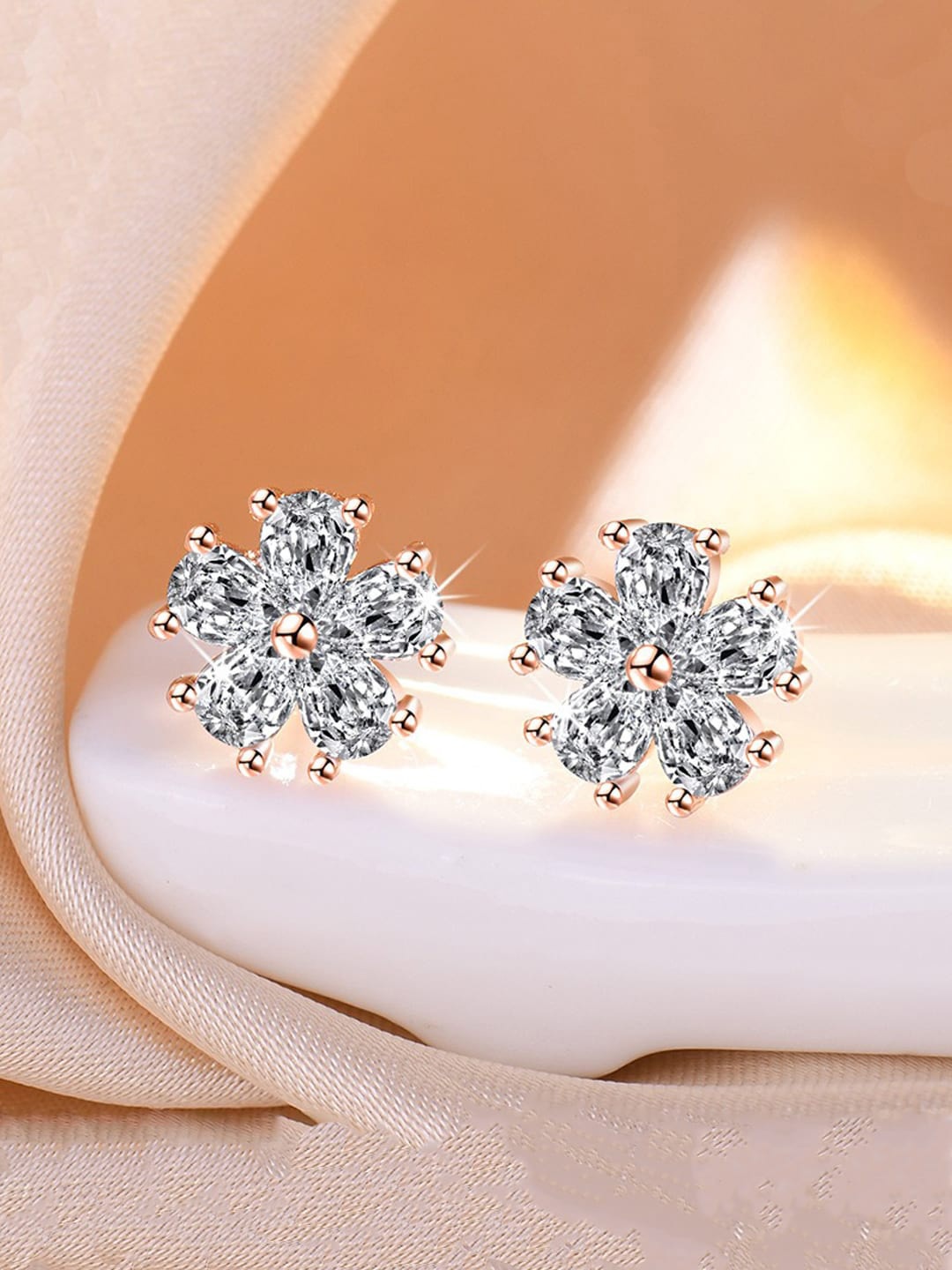 Jewels Galaxy Rose Gold Plated Floral American Diamond Studded Studs Earrings
Jewels Galaxy Rose Gold Plated Floral American Diamond Studded Studs Earrings