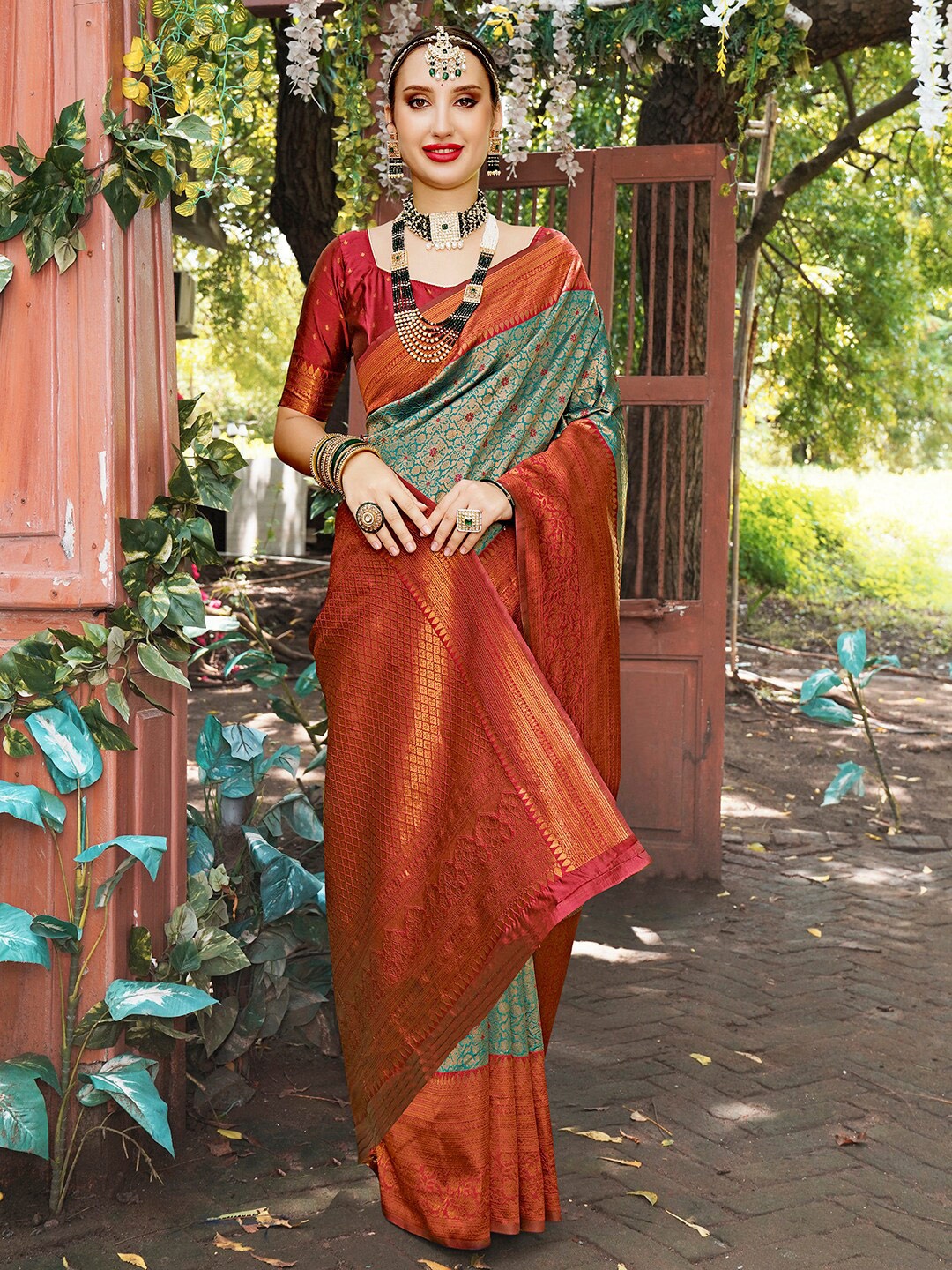 Anouk Turquoise Blue & Red Ethnic Motifs Woven Design Zari Art Silk Kanjeevaram Saree
Anouk Turquoise Blue & Red Ethnic Motifs Woven Design Zari Art Silk Kanjeevaram Saree