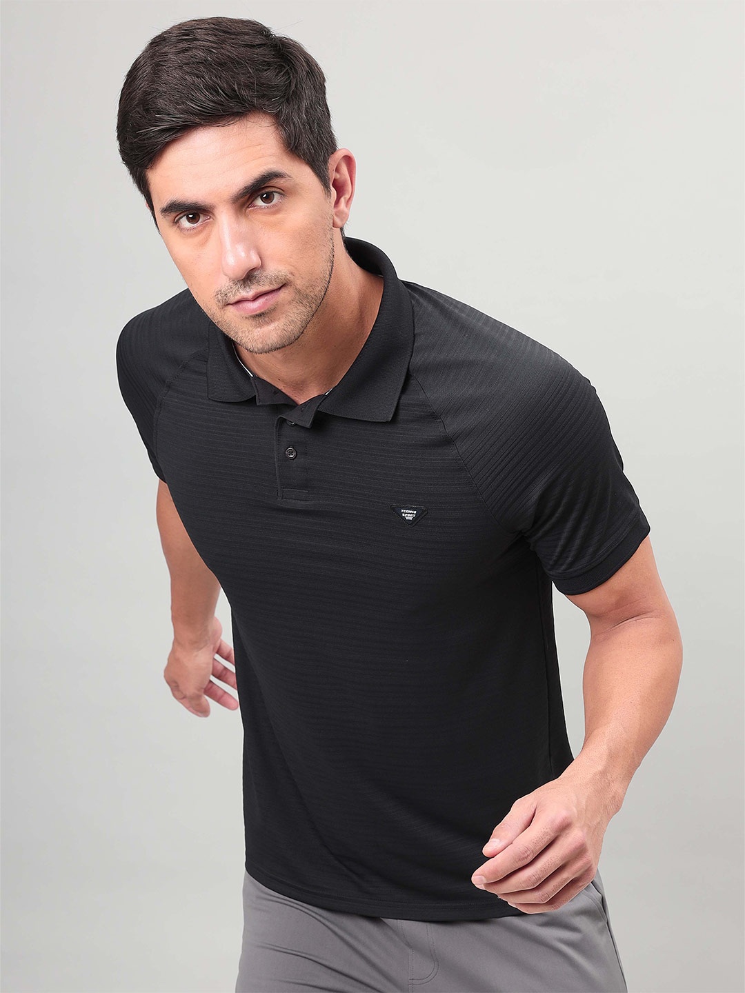 Technosport Polo Collar Anti Static Rapid Dry Raglan Sleeves Slim Fit Sports T-shirt, Black
Technosport Polo Collar Anti Static Rapid Dry Raglan Sleeves Slim Fit Sports T-shirt, Black