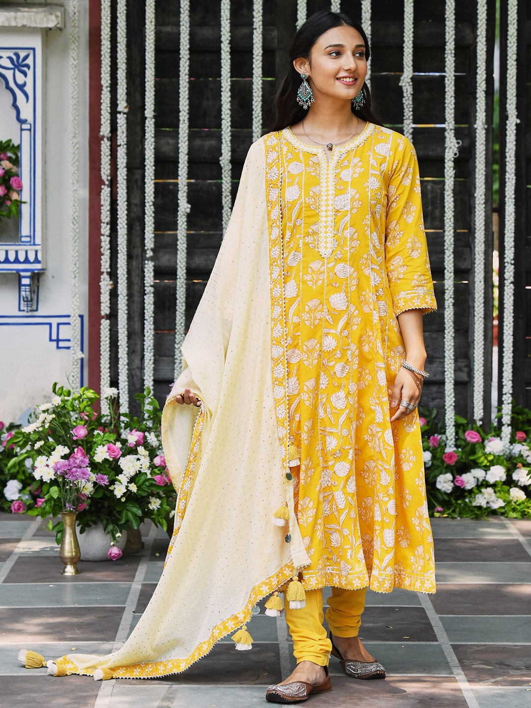 SAVI Floral Printed Mirror Work Pure Cotton Anarkali Kurta with Churidar & With Dupatta, Yellow
SAVI Floral Printed Mirror Work Pure Cotton Anarkali Kurta with Churidar & With Dupatta, Yellow