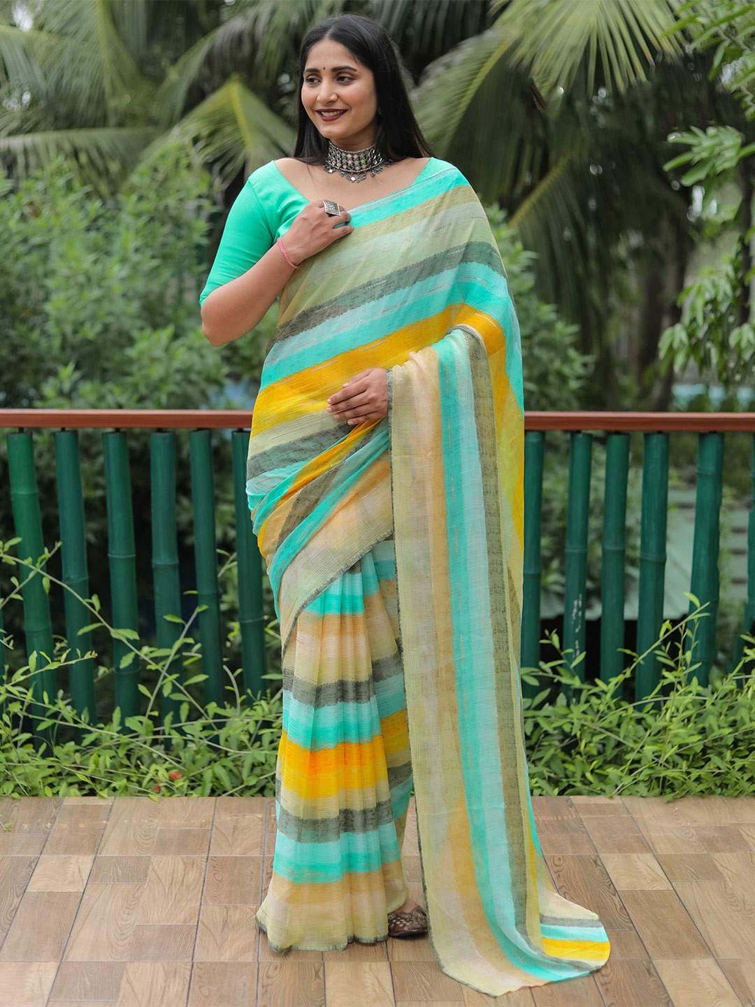 Mitera Teal Blue & Yellow Striped Saree 
Mitera Teal Blue & Yellow Striped Saree