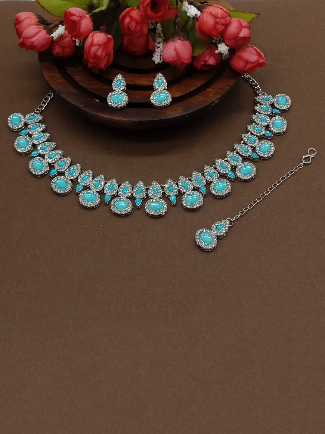 AASHISH IMITATION Rhodium-Plated Stones Studded Necklace & Earrings With Maang Tika, Turquoise blue
AASHISH IMITATION Rhodium-Plated Stones Studded Necklace & Earrings With Maang Tika, Turquoise blue