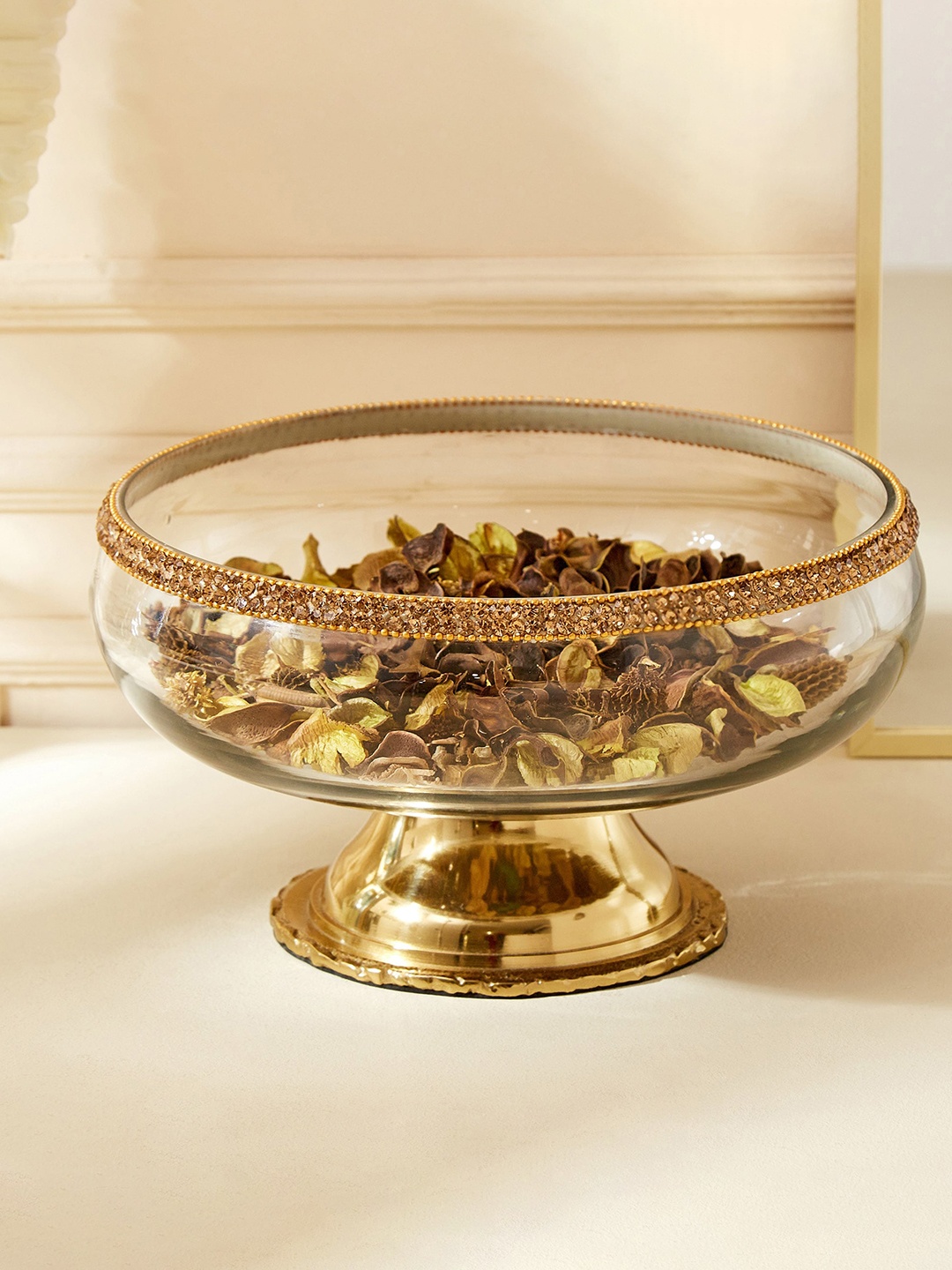 Home Centre Fables Blane Gold-Toned & Transparent Glass Decorative Bowl with Metal Base
Home Centre Fables Blane Gold-Toned & Transparent Glass Decorative Bowl with Metal Base