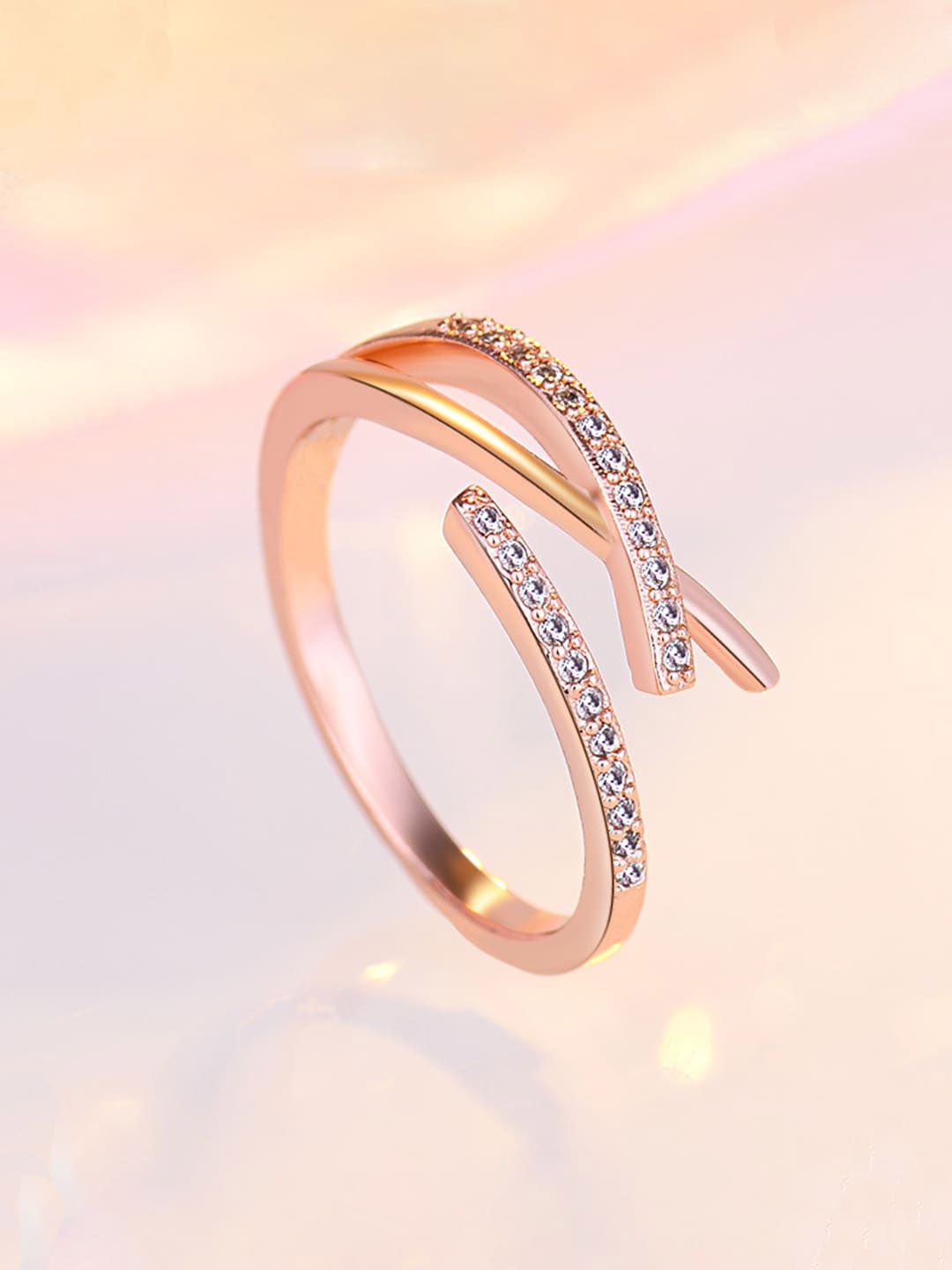 Jewels Galaxy Rose Gold-Plated American Diamond-Studded Adjustable Finger Ring
Jewels Galaxy Rose Gold-Plated American Diamond-Studded Adjustable Finger Ring