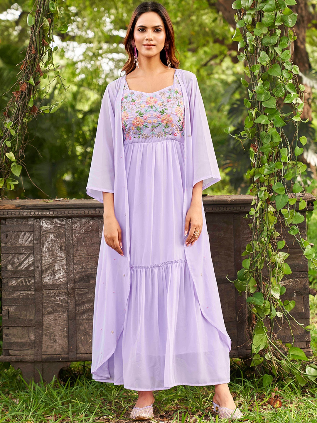 Tikhi Imli Floral Embroidered Tiered A-Line Georgette Kurta with Trousers with Shrug, Lavender
Tikhi Imli Floral Embroidered Tiered A-Line Georgette Kurta with Trousers with Shrug, Lavender