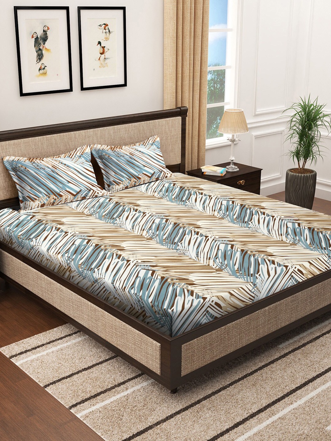 KLOTTHE Beige & Blue Printed 300 TC Super King Fitted Bedsheet With 2 Pillow Covers
KLOTTHE Beige & Blue Printed 300 TC Super King Fitted Bedsheet With 2 Pillow Covers