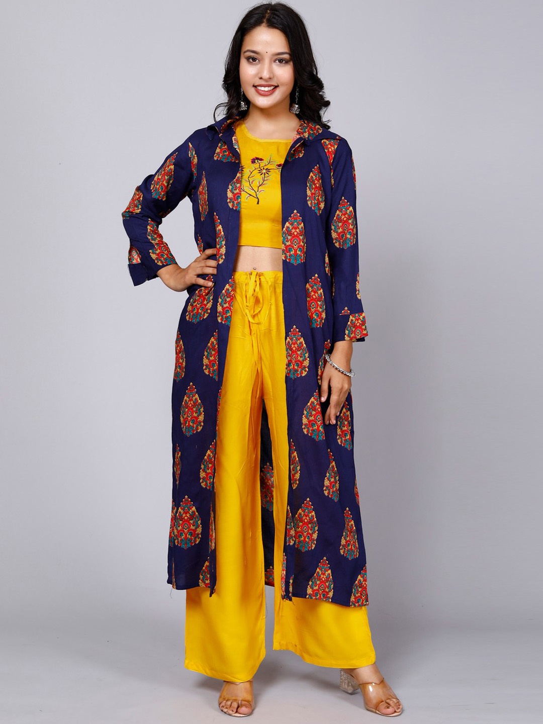 Miramaar Embroidered Top & Palazzos With Floral Printed Longline A-Line Shrug, Mustard
Miramaar Embroidered Top & Palazzos With Floral Printed Longline A-Line Shrug, Mustard