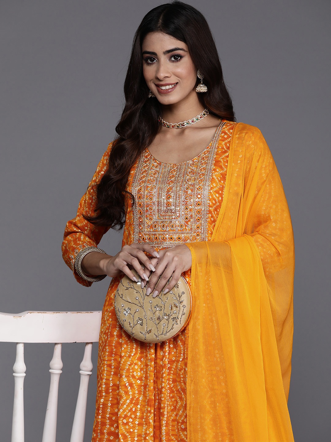 Indo Era Women Yoke Design Pleated Mirror Work Kurta with Trousers & Dupatta, Yellow
Indo Era Women Yoke Design Pleated Mirror Work Kurta with Trousers & Dupatta, Yellow