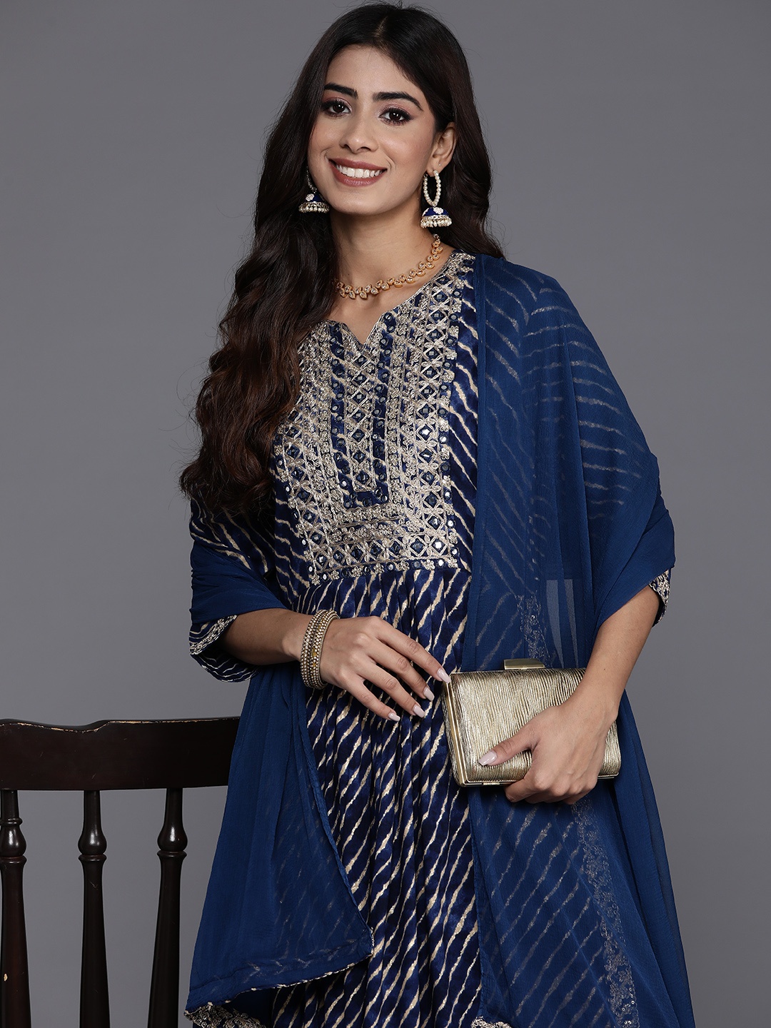 Indo Era Women Floral Yoke Design Regular Sequinned Kurta with Trousers & Dupatta, Navy blue
Indo Era Women Floral Yoke Design Regular Sequinned Kurta with Trousers & Dupatta, Navy blue