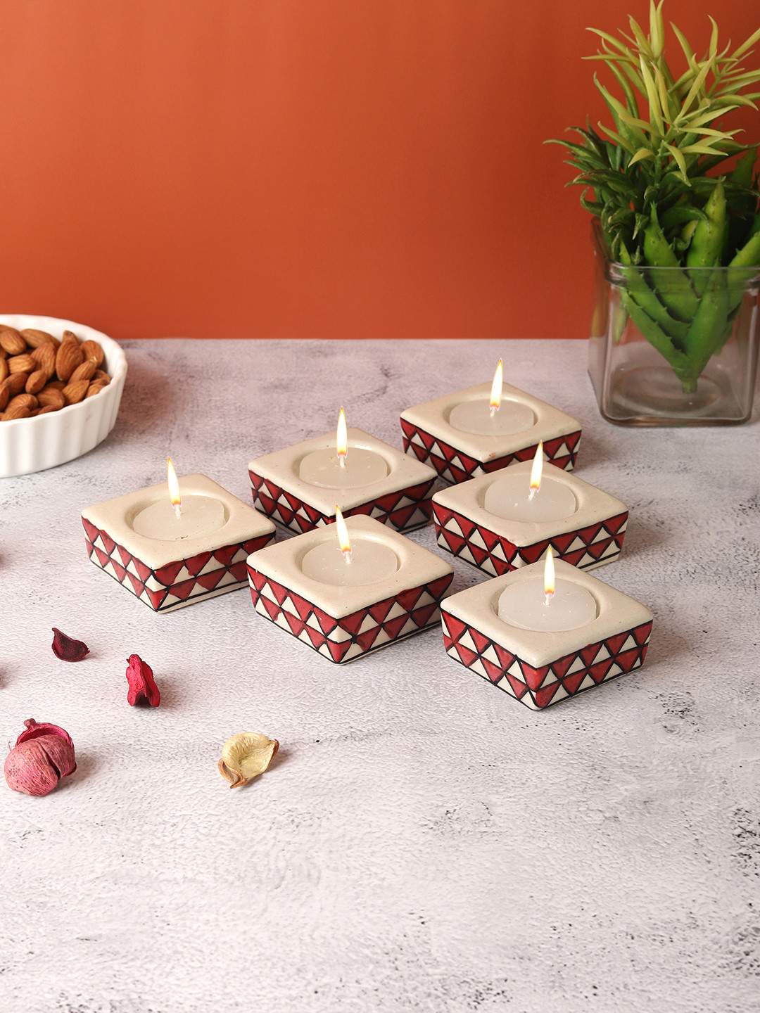 VarEesha 6 Pcs Red & Beige Geometric Printed Square Ceramic Diyas Tea Light Candle Holders
VarEesha 6 Pcs Red & Beige Geometric Printed Square Ceramic Diyas Tea Light Candle Holders