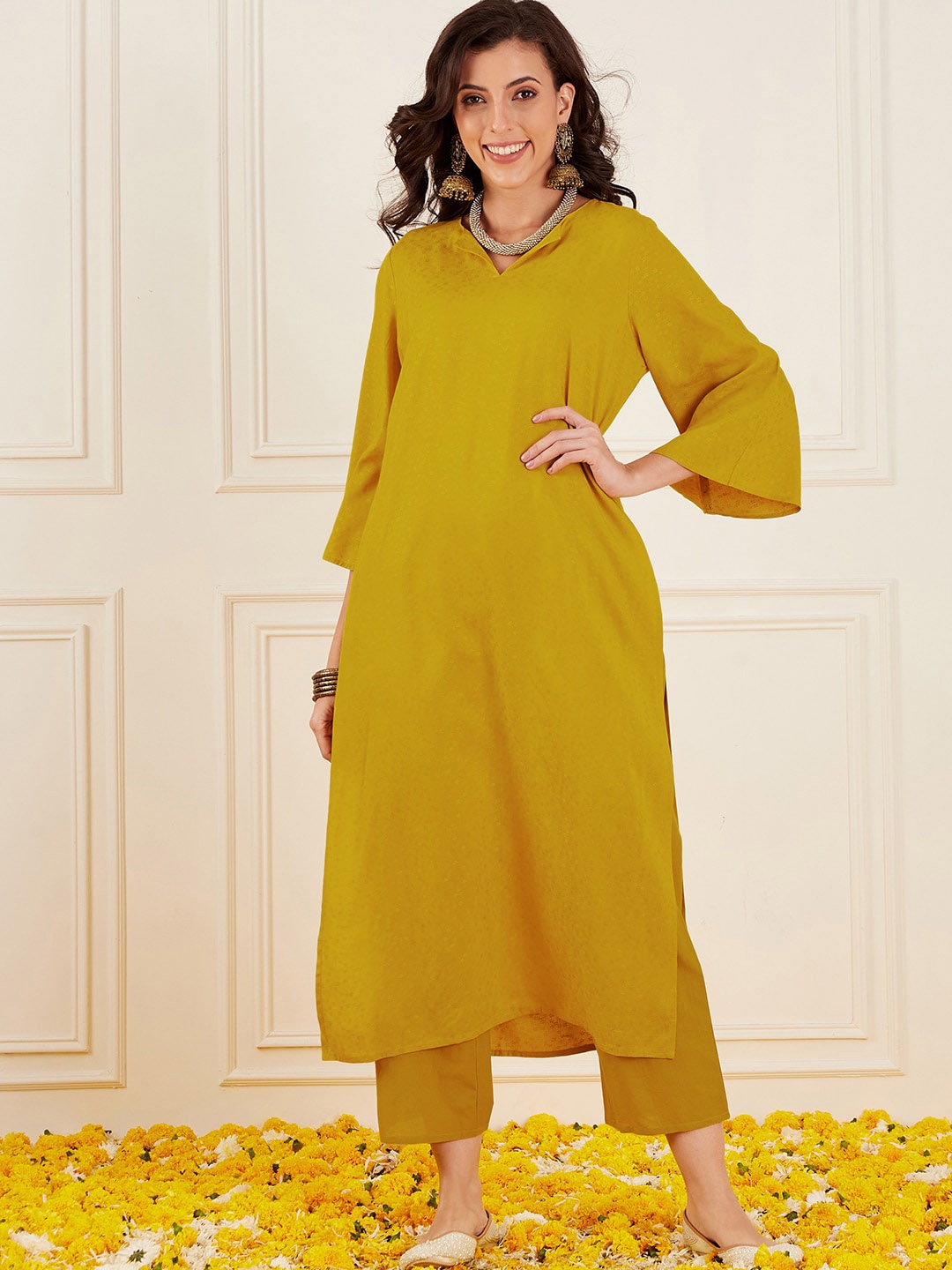 Sangria Round Neck With Notch Flared Sleeves Dobby Straight Kurta & Trousers, Mustard
Sangria Round Neck With Notch Flared Sleeves Dobby Straight Kurta & Trousers, Mustard
