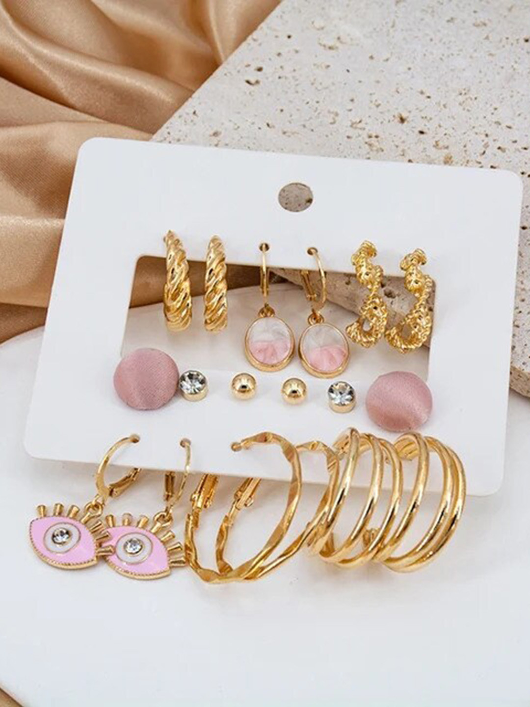 VIEN Set Of 9 Gold-Plated Teardrop Shaped Studs Earrings
VIEN Set Of 9 Gold-Plated Teardrop Shaped Studs Earrings