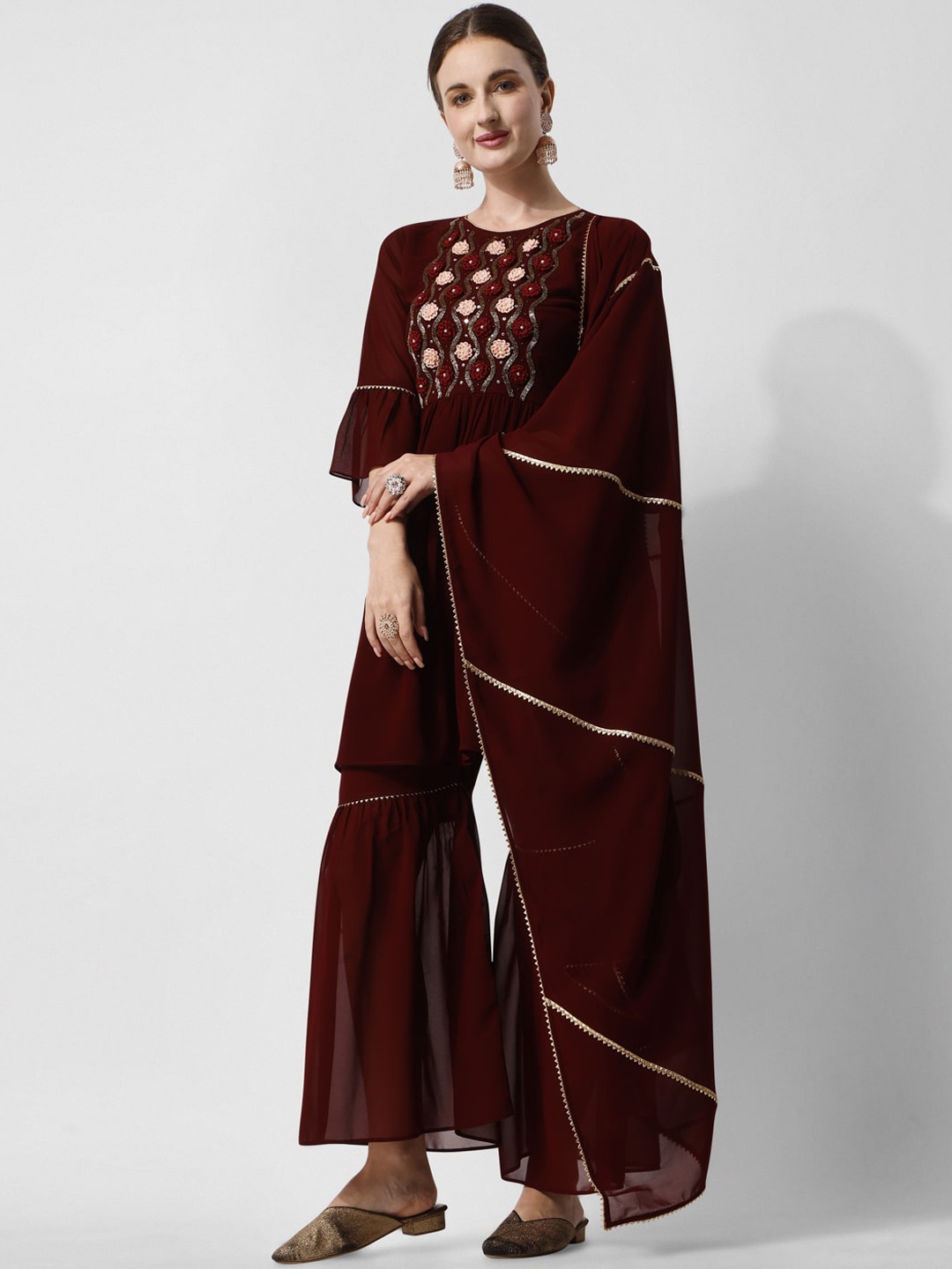 KALINI Ethnic Motifs Yoke Design Pleated Thread Work Kurta & Sharara With Dupatta, Burgundy
KALINI Ethnic Motifs Yoke Design Pleated Thread Work Kurta & Sharara With Dupatta, Burgundy