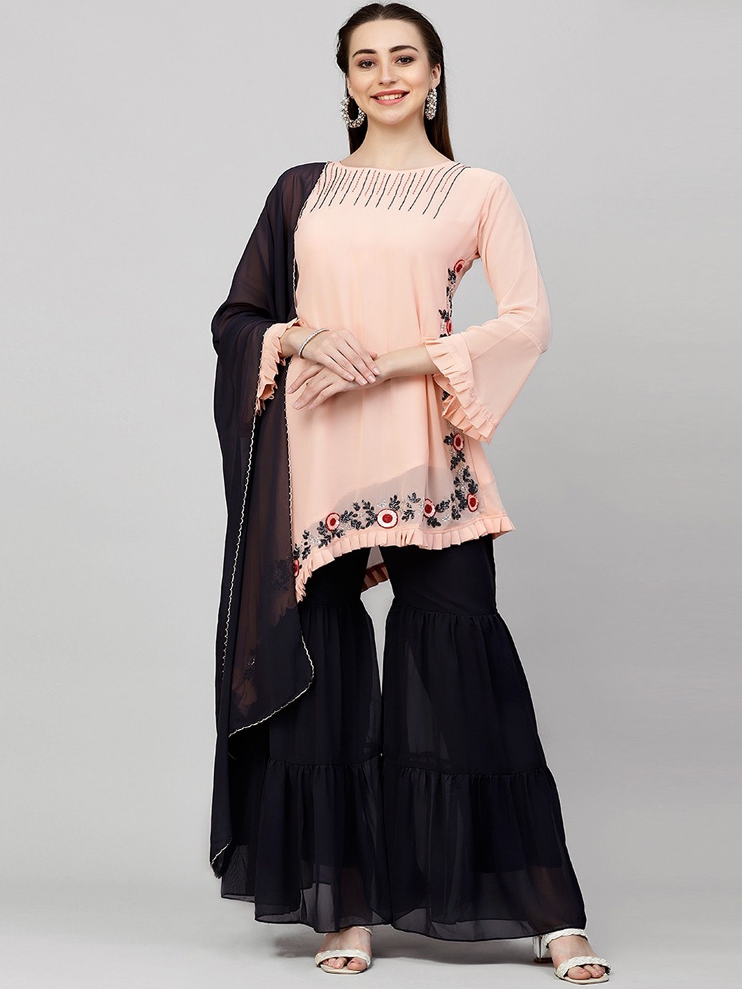 18 ATTITUDE Floral Embroidered Regular Thread Work Kurti with Sharara & With Dupatta, Peach
18 ATTITUDE Floral Embroidered Regular Thread Work Kurti with Sharara & With Dupatta, Peach