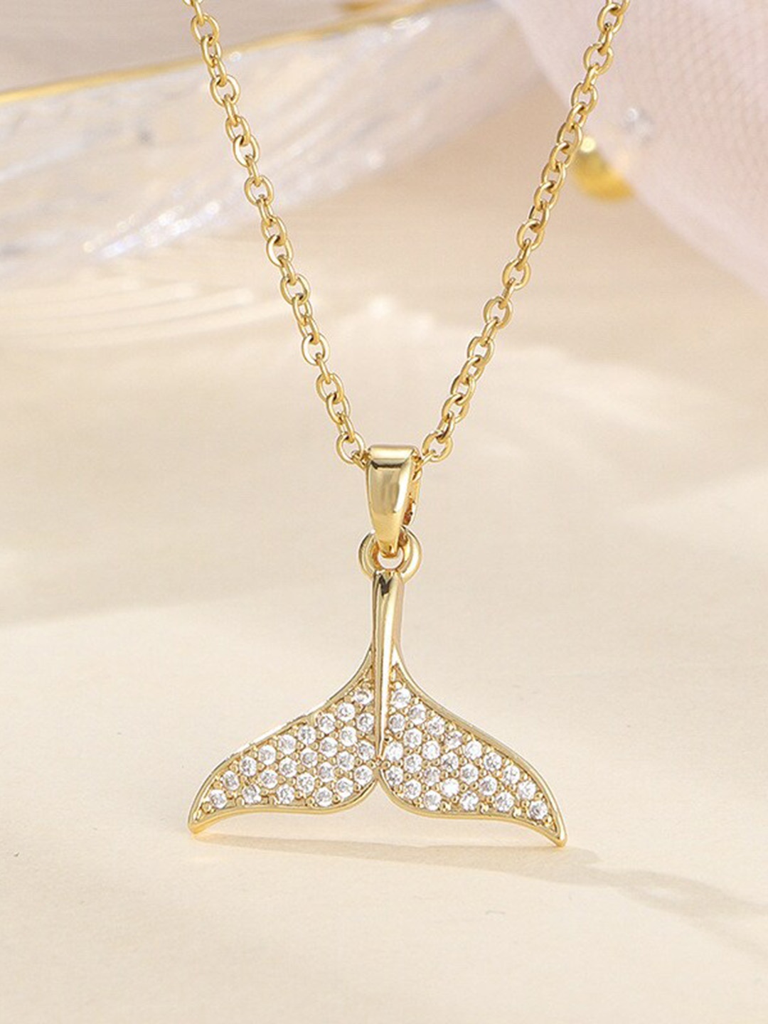 MYKI Gold-Plated Stainless Steel Cubic Zirconia Studded Fish Tail-Charm Pendant With Chain
MYKI Gold-Plated Stainless Steel Cubic Zirconia Studded Fish Tail-Charm Pendant With Chain