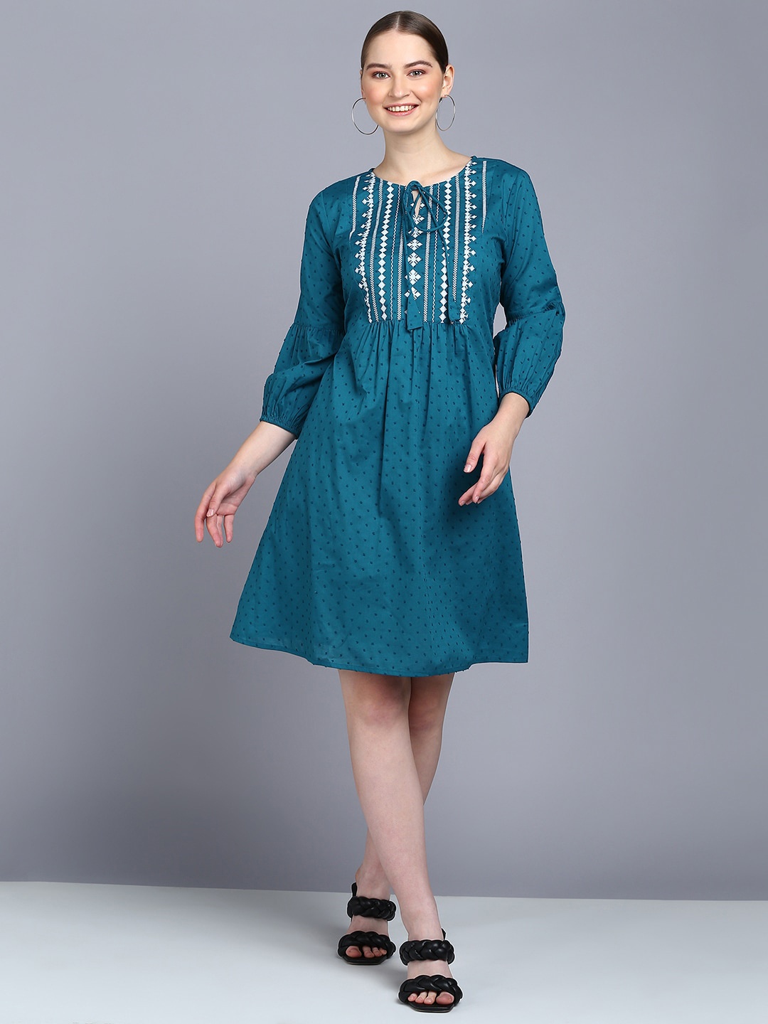 Mast & Harbour Teal Ethnic Motifs Embroidered Tie-Up Neck Dobby Cotton A-Line Ethnic Dress
Mast & Harbour Teal Ethnic Motifs Embroidered Tie-Up Neck Dobby Cotton A-Line Ethnic Dress