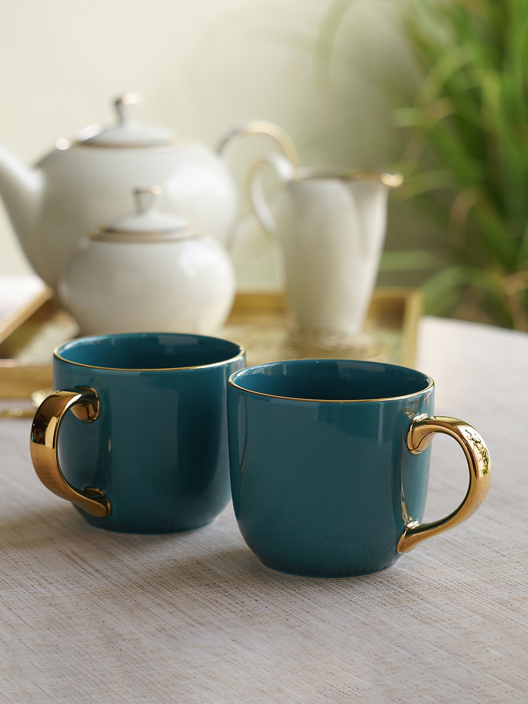Pure Home and Living 2 Pcs Blue & Gold-Toned Solid Porcelain Coffee Mugs - 300 ML Each
Pure Home and Living 2 Pcs Blue & Gold-Toned Solid Porcelain Coffee Mugs - 300 ML Each