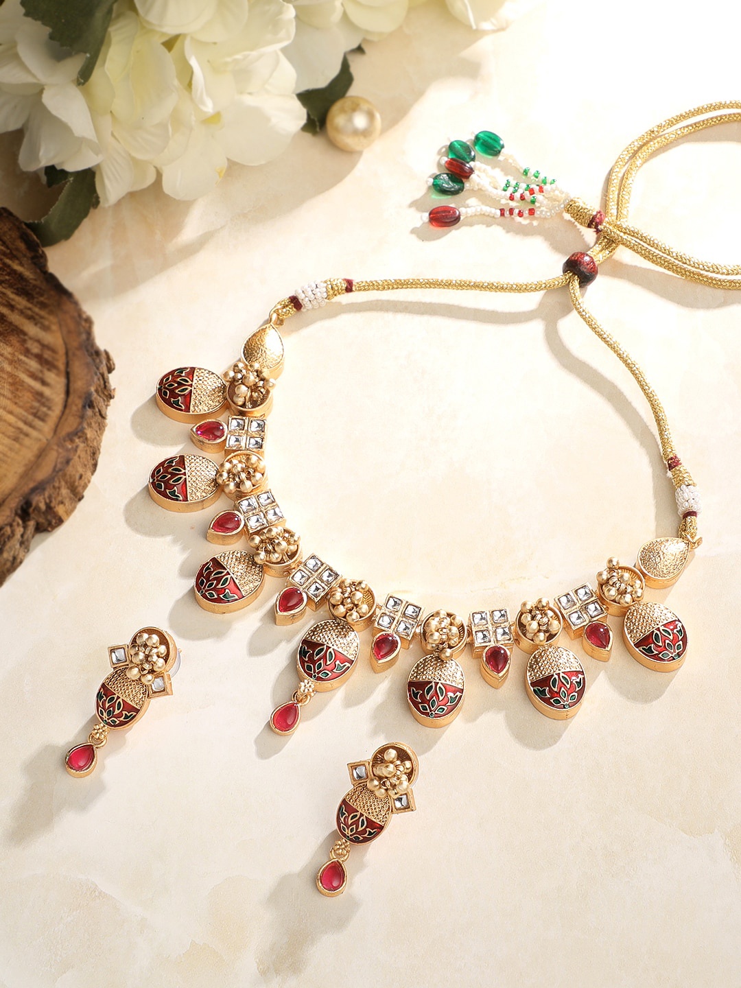 ASMITTA JEWELLERY Gold Plated Kundan-Studded Choker Necklace & Earrings
ASMITTA JEWELLERY Gold Plated Kundan-Studded Choker Necklace & Earrings