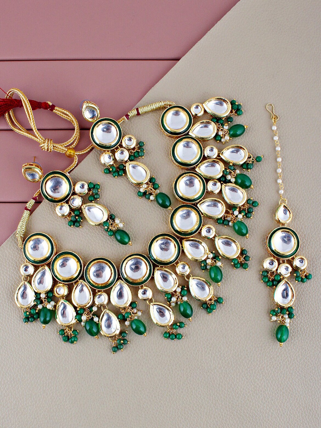 LUCKY JEWELLERY Gold-Plated Kundan-Studded & Beaded Necklace With Earrings & Maang Tika
LUCKY JEWELLERY Gold-Plated Kundan-Studded & Beaded Necklace With Earrings & Maang Tika