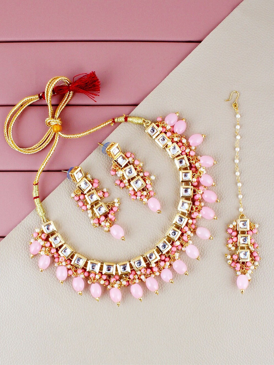 LUCKY JEWELLERY Gold-Plated Kundan-Studded & Beaded Necklace With Earrings & Maang Tika
LUCKY JEWELLERY Gold-Plated Kundan-Studded & Beaded Necklace With Earrings & Maang Tika