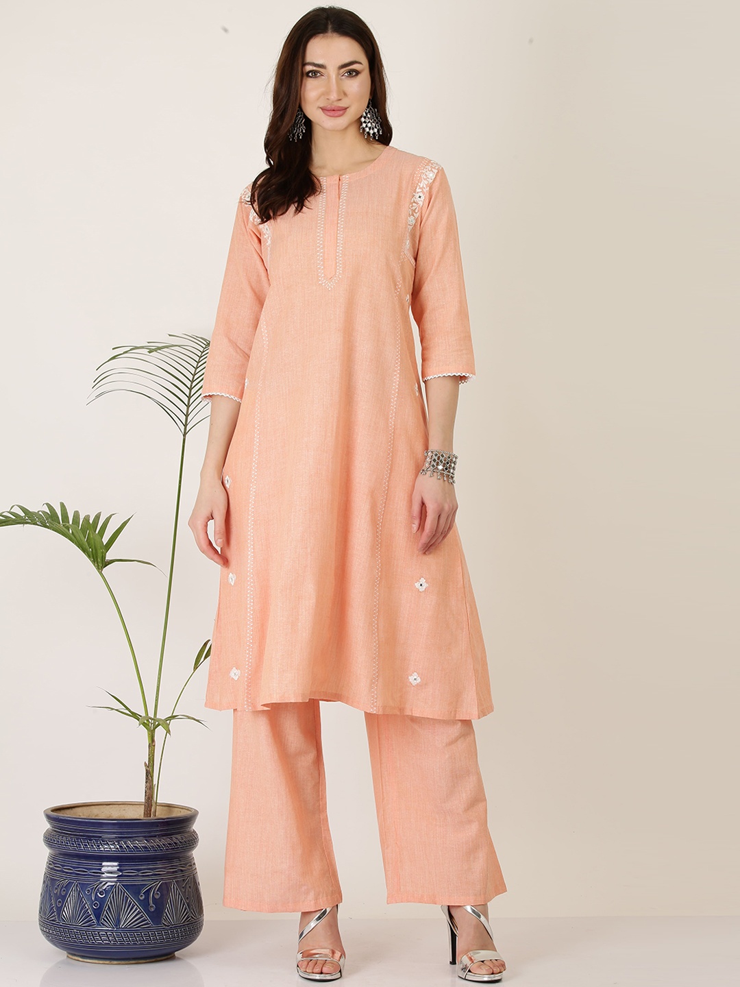 KAANCHIE NANGGIA Ethnic Motifs Embroidered A-Line Thread Work Kurta With Palazzos, Peach
KAANCHIE NANGGIA Ethnic Motifs Embroidered A-Line Thread Work Kurta With Palazzos, Peach