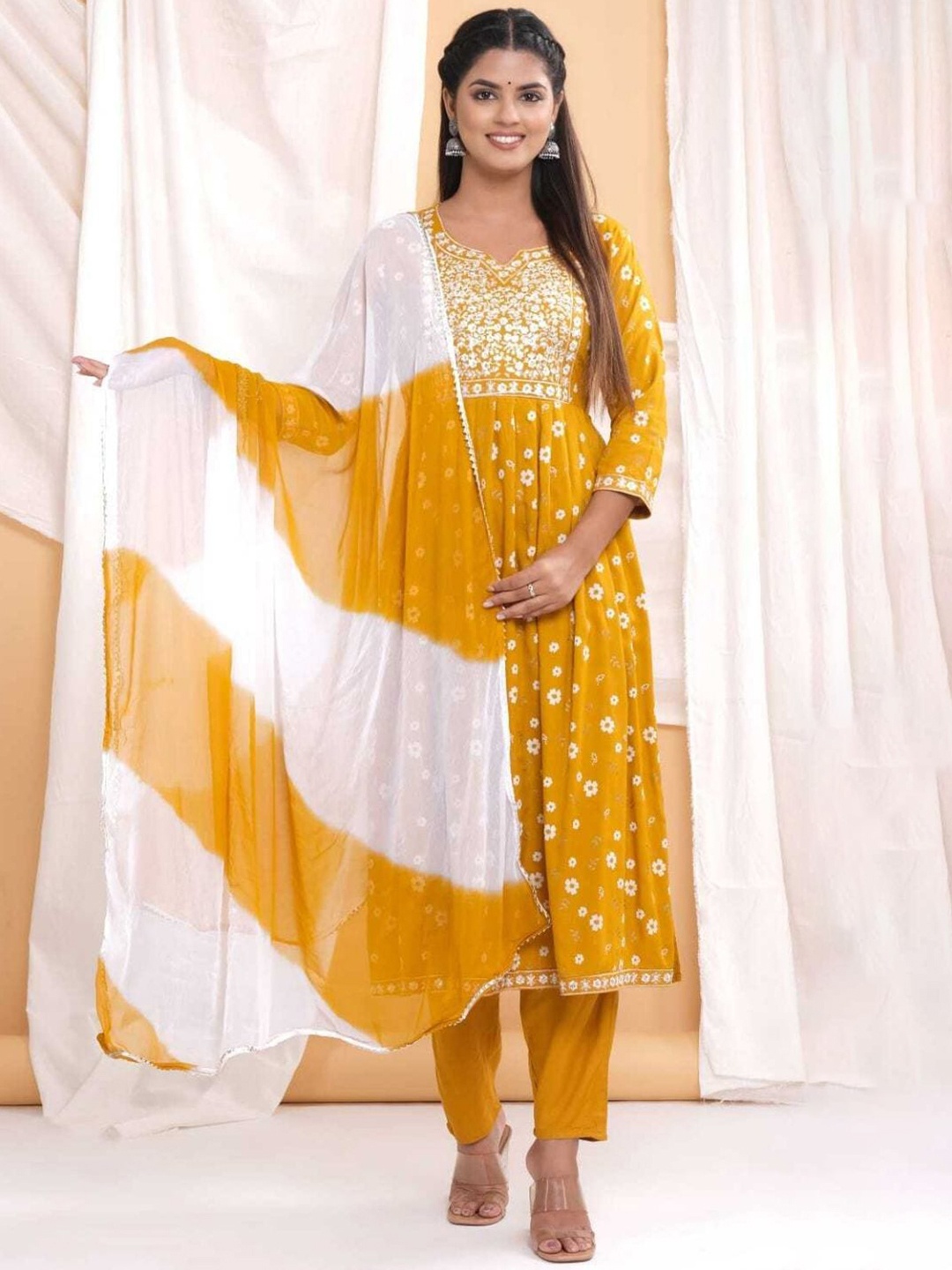 Collection Rj23 Floral Printed Thread Work Pleated A-Line Kurta & Trouser With Dupatta, Mustard
Collection Rj23 Floral Printed Thread Work Pleated A-Line Kurta & Trouser With Dupatta, Mustard
