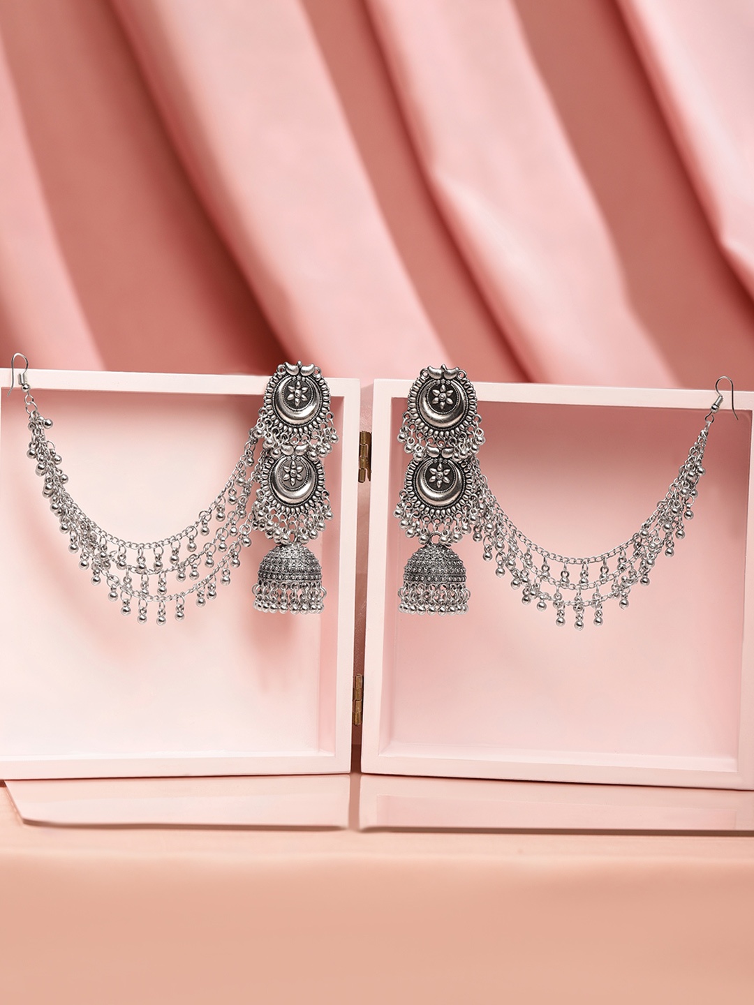 Rubans Oxidised Silver Plated Ghumroo Beaded Dome Jhumka with Triple Layer Hair Chain
Rubans Oxidised Silver Plated Ghumroo Beaded Dome Jhumka with Triple Layer Hair Chain