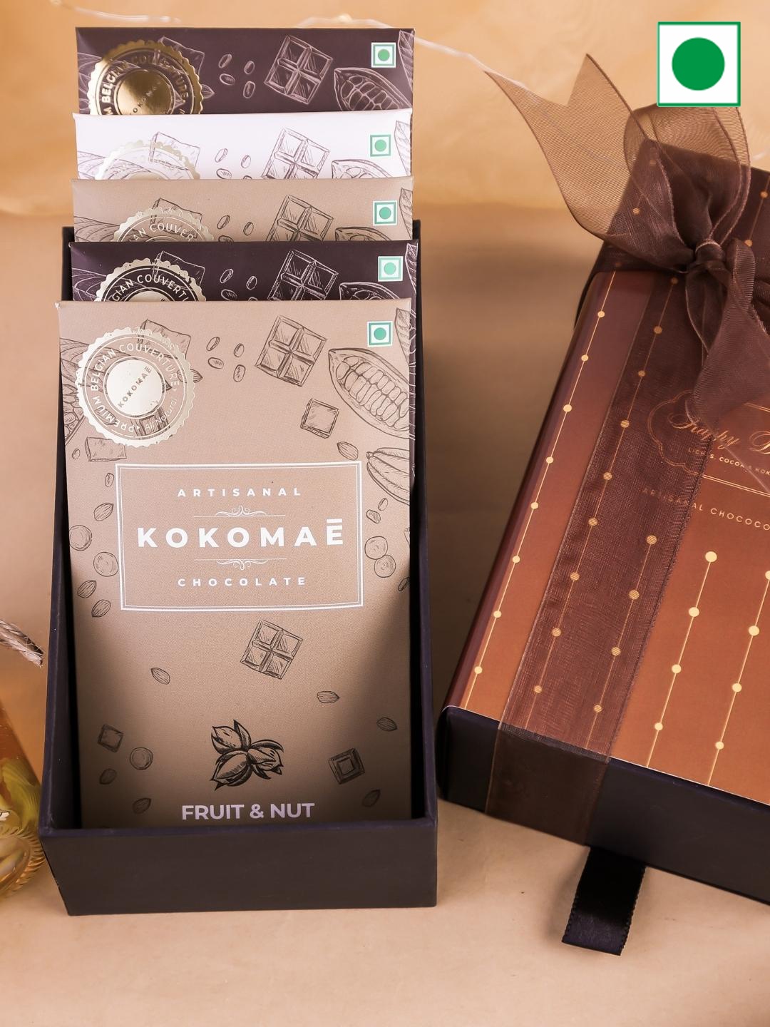 Kokomae Artisanal Chocolate Chocolicious Diwali Medley Gift Hamper with Offering - 350 gms, Brown
Kokomae Artisanal Chocolate Chocolicious Diwali Medley Gift Hamper with Offering - 350 gms, Brown