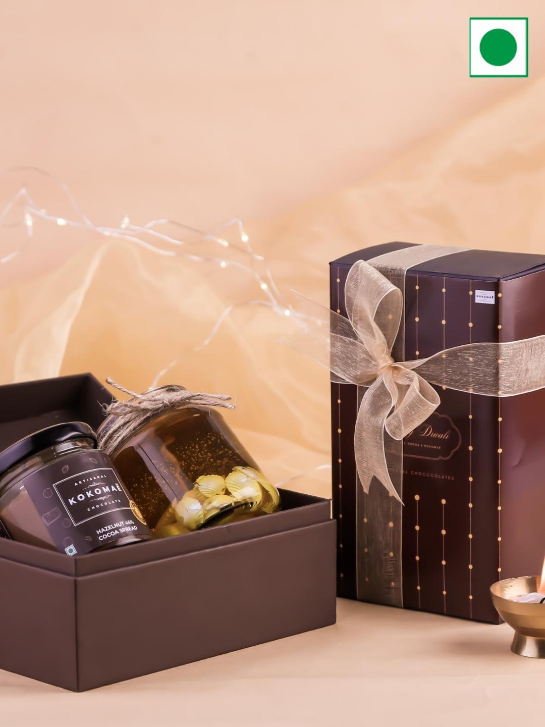 Kokomae Artisanal Chocolate Diwali Gift with Hazelnut Chocolate Spread & Candle - 300gms, Brown
Kokomae Artisanal Chocolate Diwali Gift with Hazelnut Chocolate Spread & Candle - 300gms, Brown