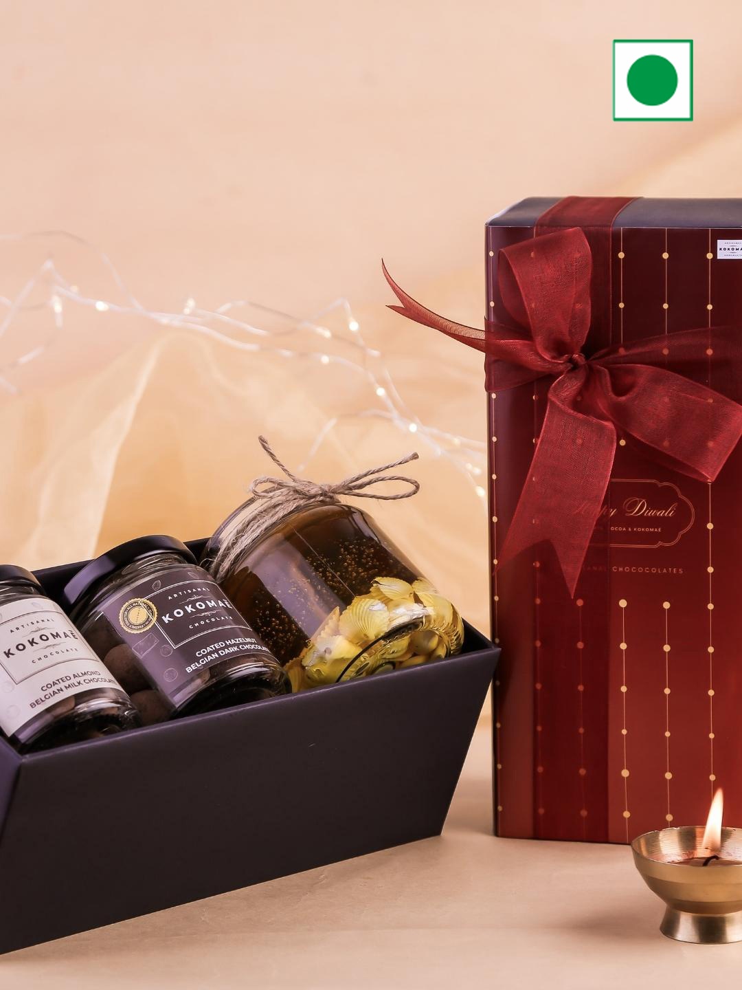 Kokomae Artisanal Chocolate Golden Aura With 2 Belgian Coated Nuts & A Candle, Brown
Kokomae Artisanal Chocolate Golden Aura With 2 Belgian Coated Nuts & A Candle, Brown