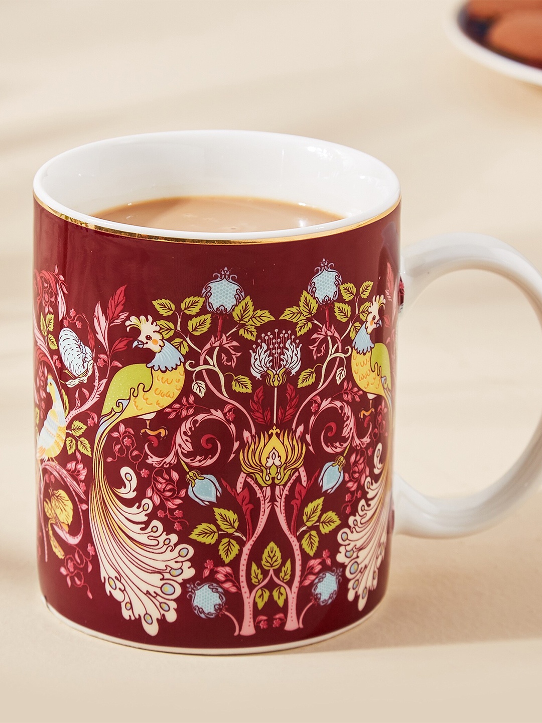 Home Centre Feslix Morris Red & White Ethnic Motifs Printed Porcelain Glossy Mug - 340 ML
Home Centre Feslix Morris Red & White Ethnic Motifs Printed Porcelain Glossy Mug - 340 ML