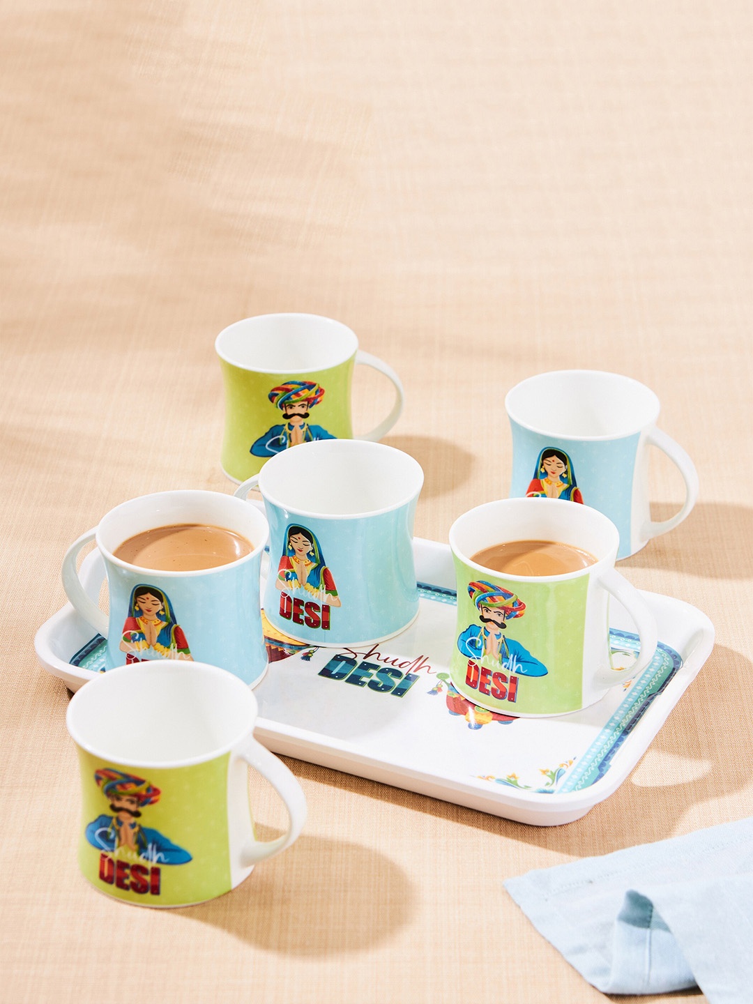 Home Centre 7 Pcs White & Green Printed Bone China Glossy Mugs with Tray - 200 ML Each
Home Centre 7 Pcs White & Green Printed Bone China Glossy Mugs with Tray - 200 ML Each