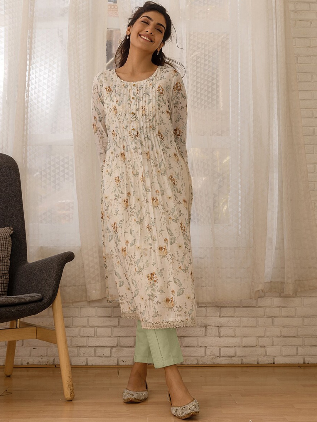 Ishin Floral Printed Beads and Stones Pleated Linen A-Line Kurta with Trousers & Dupatta, Off white
Ishin Floral Printed Beads and Stones Pleated Linen A-Line Kurta with Trousers & Dupatta, Off white