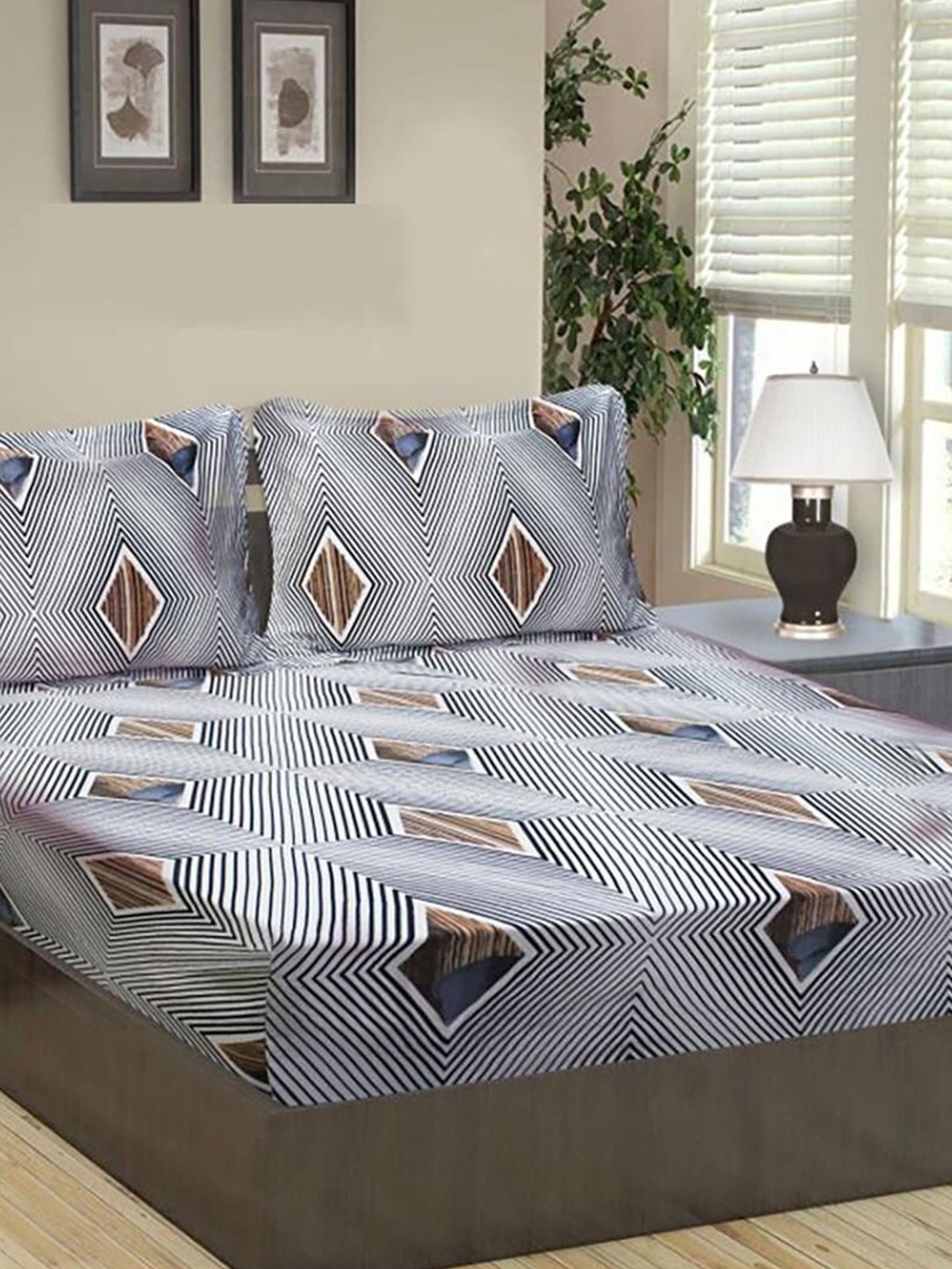 HOMETALES White & Navy Blue Geometric 120 TC Single Fitted Bedsheet with 2 Pillow Covers
HOMETALES White & Navy Blue Geometric 120 TC Single Fitted Bedsheet with 2 Pillow Covers