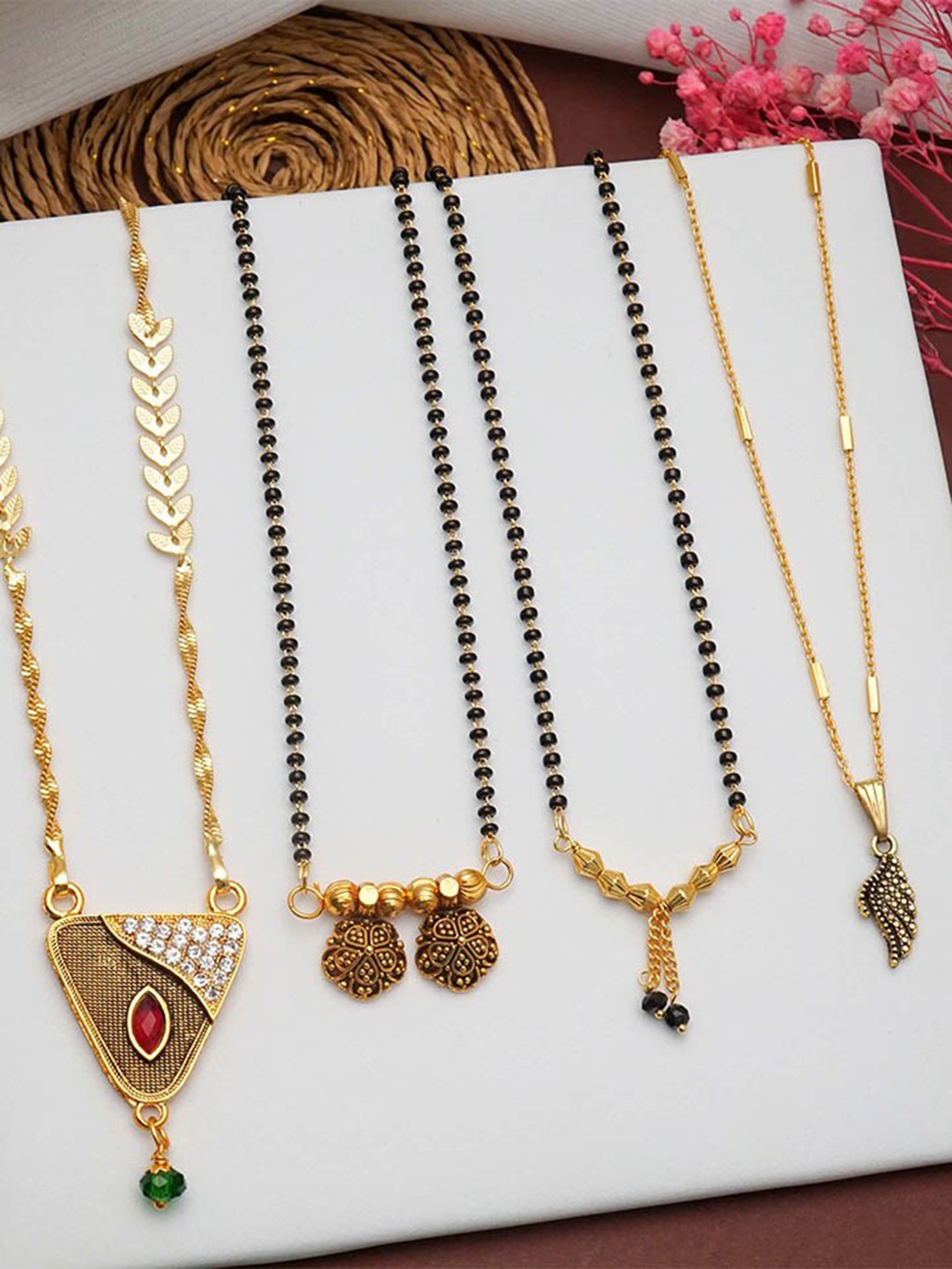 Ramdev Art Fashion Jwellery Set Of 4 Gold Plated Stone Studded & Beaded Mangalsutras
Ramdev Art Fashion Jwellery Set Of 4 Gold Plated Stone Studded & Beaded Mangalsutras